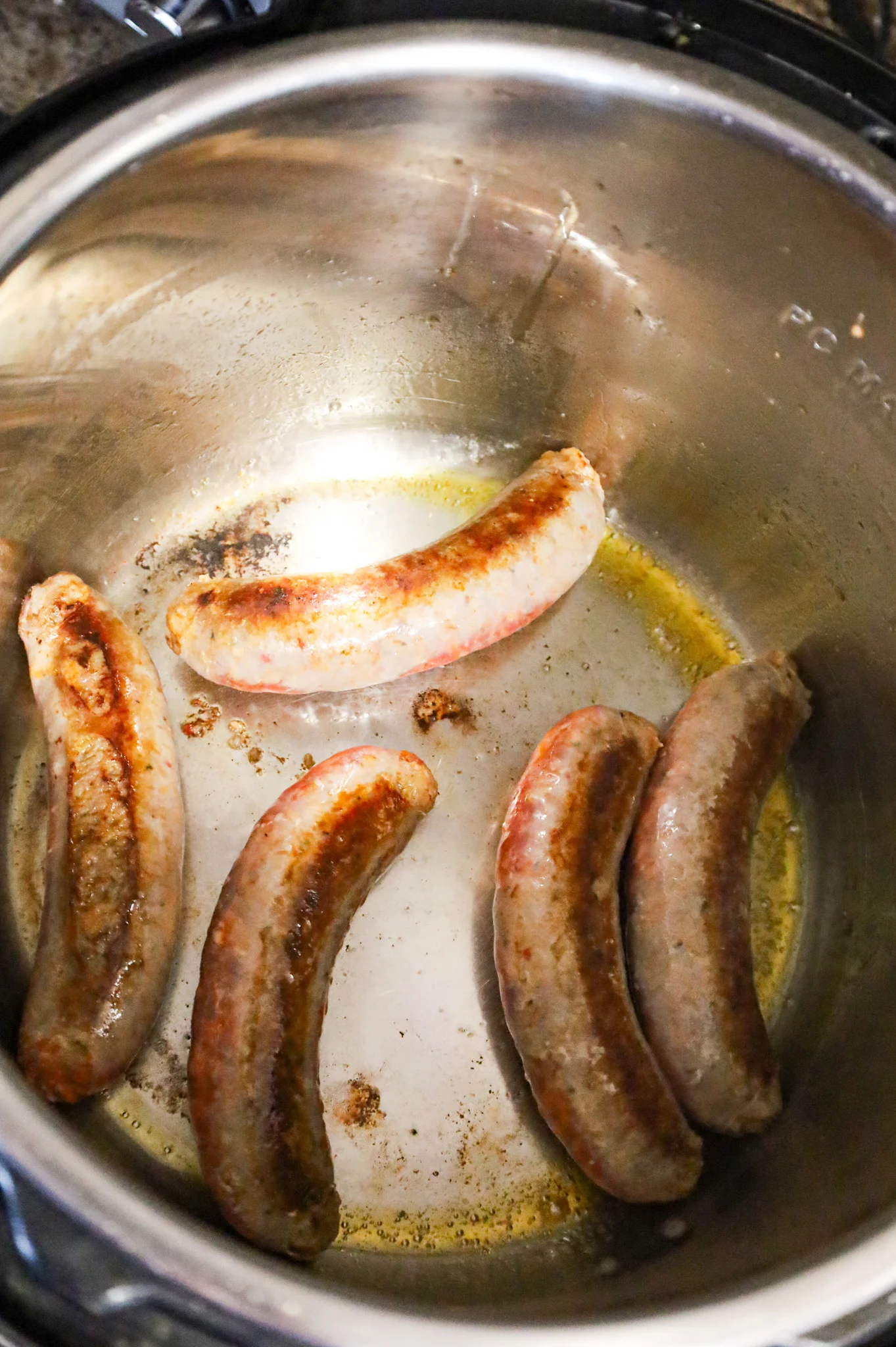 browning Italian sausages in an Instant Pot