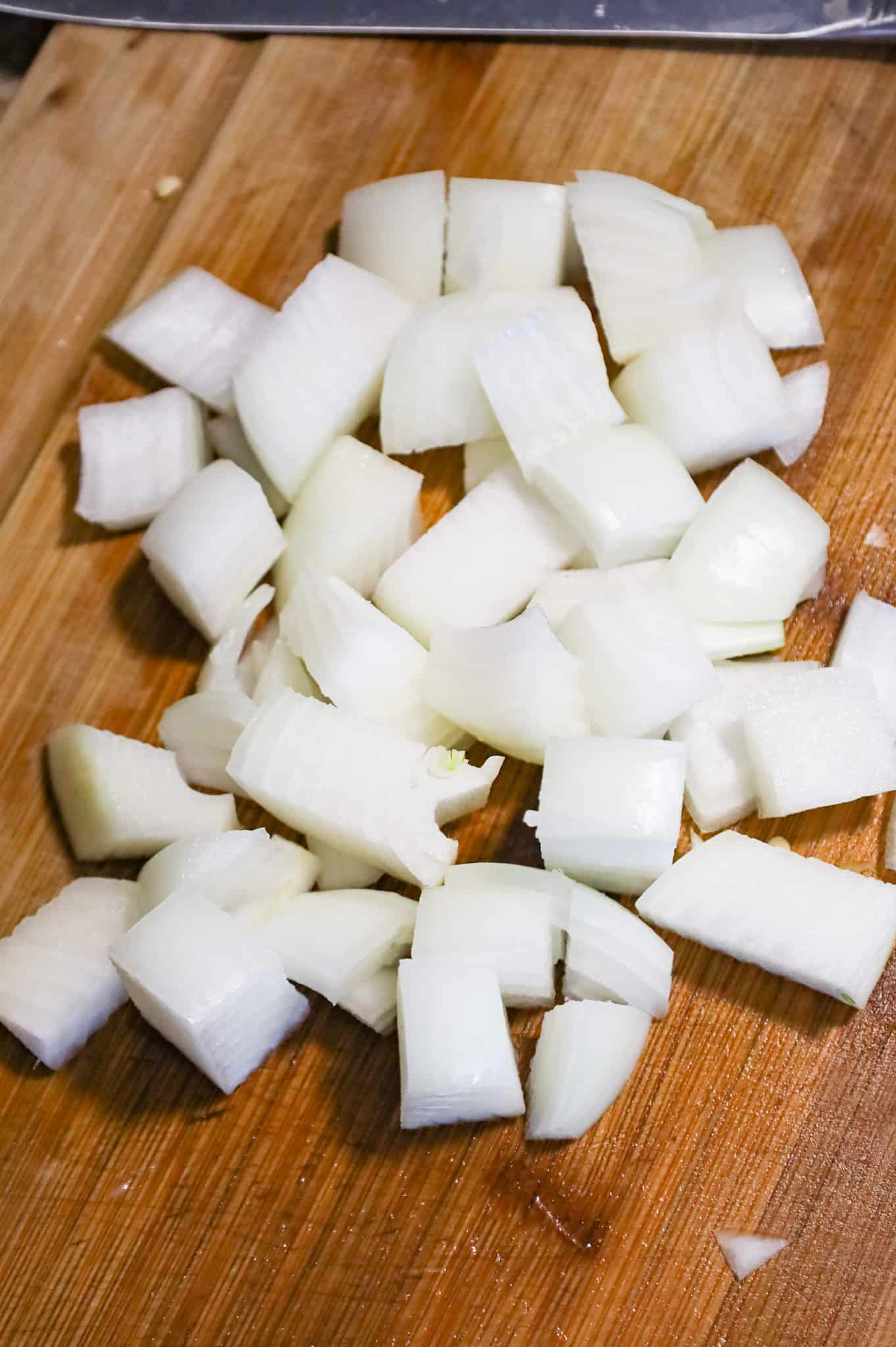 diced onions on a cutting board