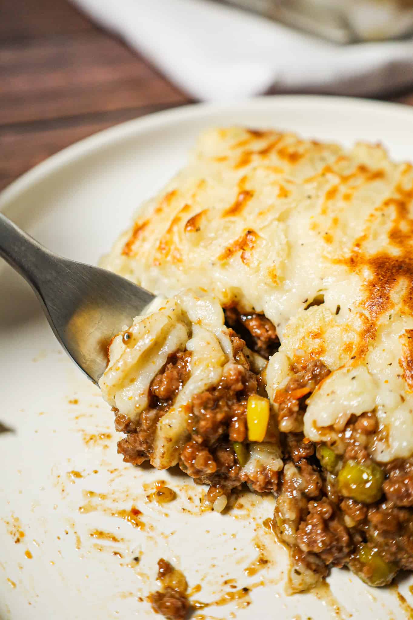 Instant Pot Shepherd's Pie is an easy pressure cooker dinner with a ground beef and vegetable mixture cooked in the pot along with the potatoes.