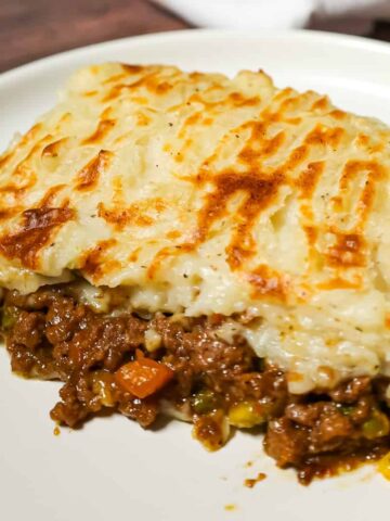 Instant Pot Shepherd's Pie is an easy pressure cooker dinner with a ground beef and vegetable mixture cooked in the pot along with the potatoes.