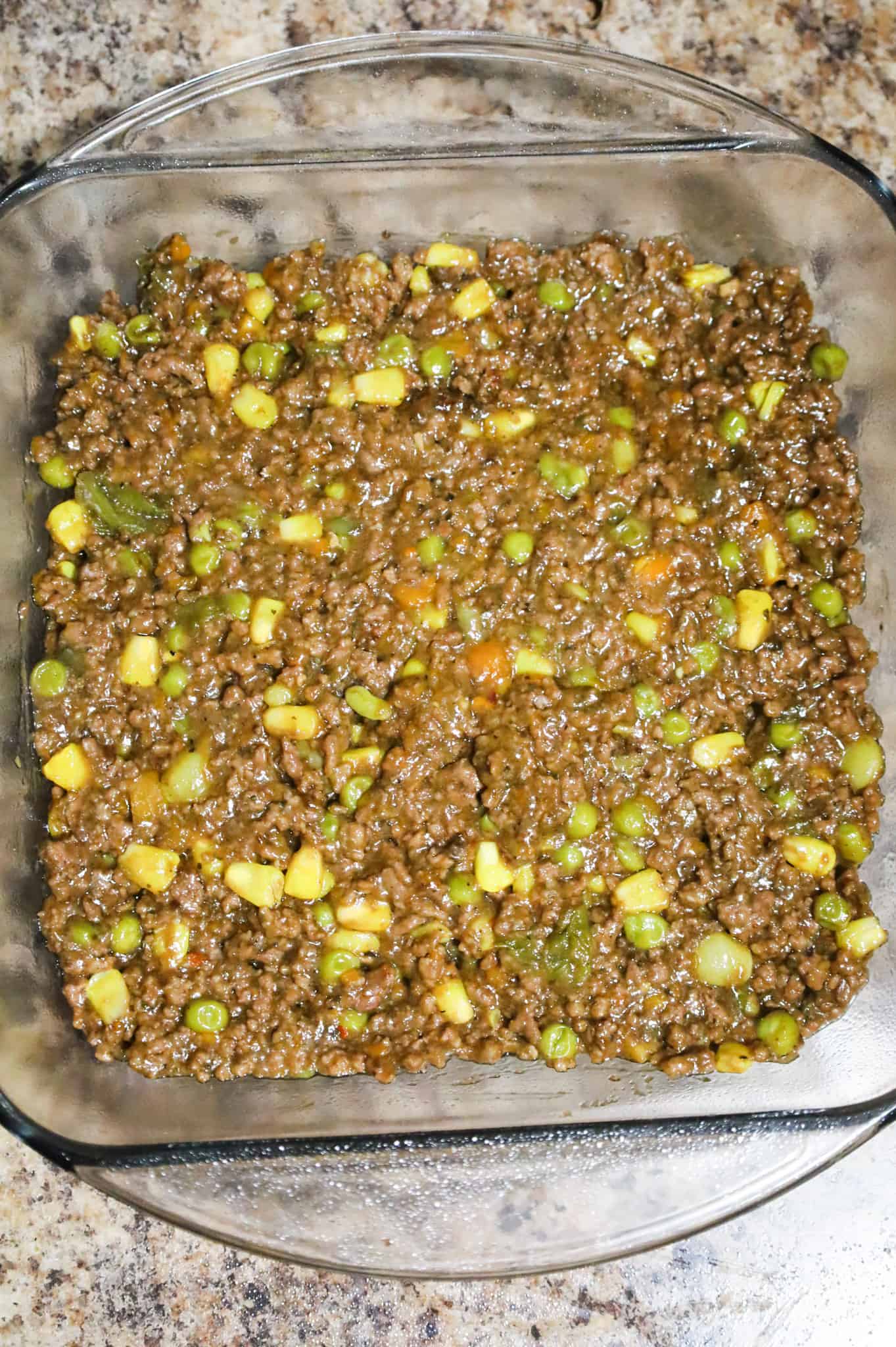 ground beef and vegetable mixture in a baking dish
