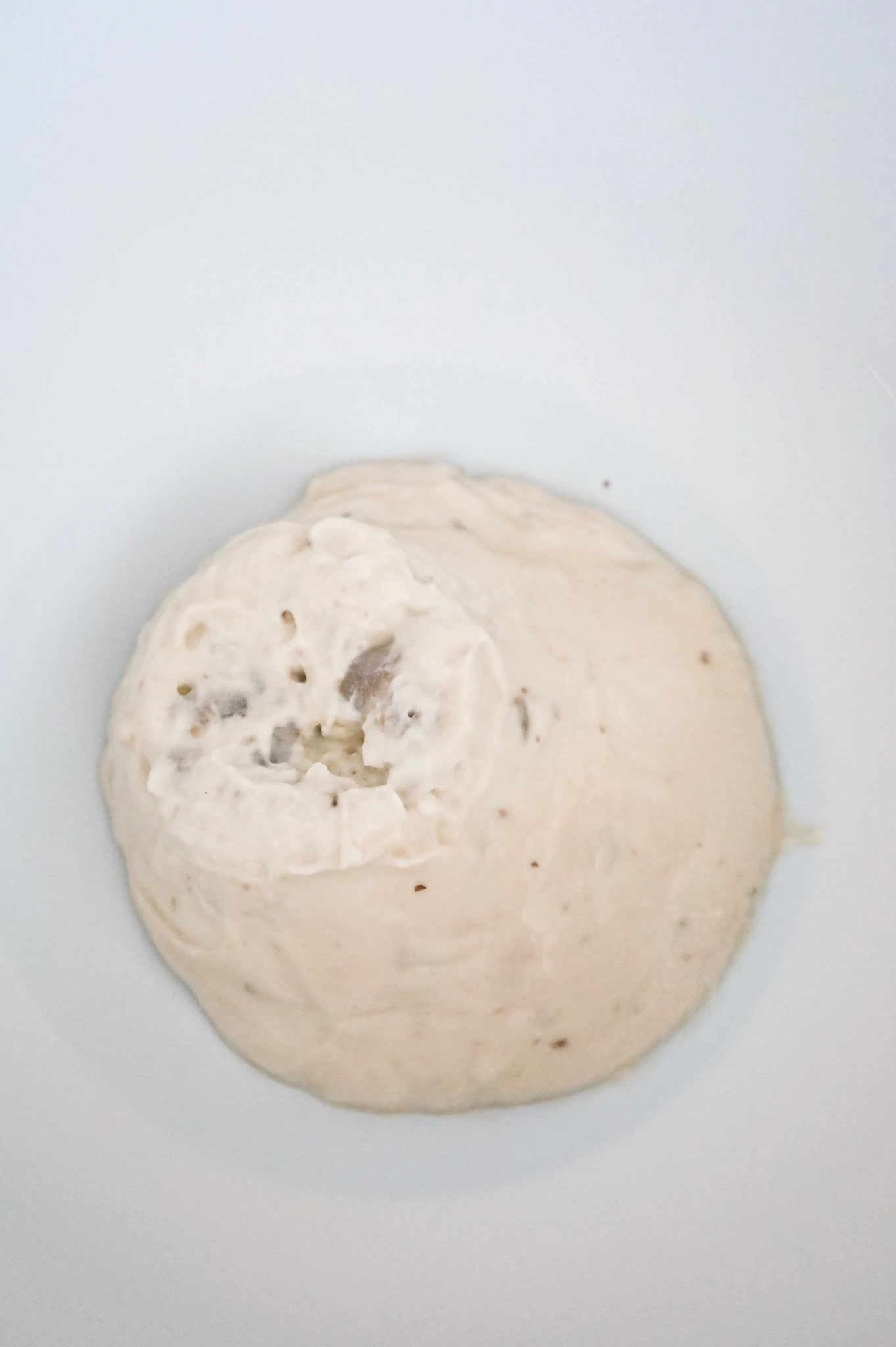 condensed cream of mushroom soup in a mixing bowl