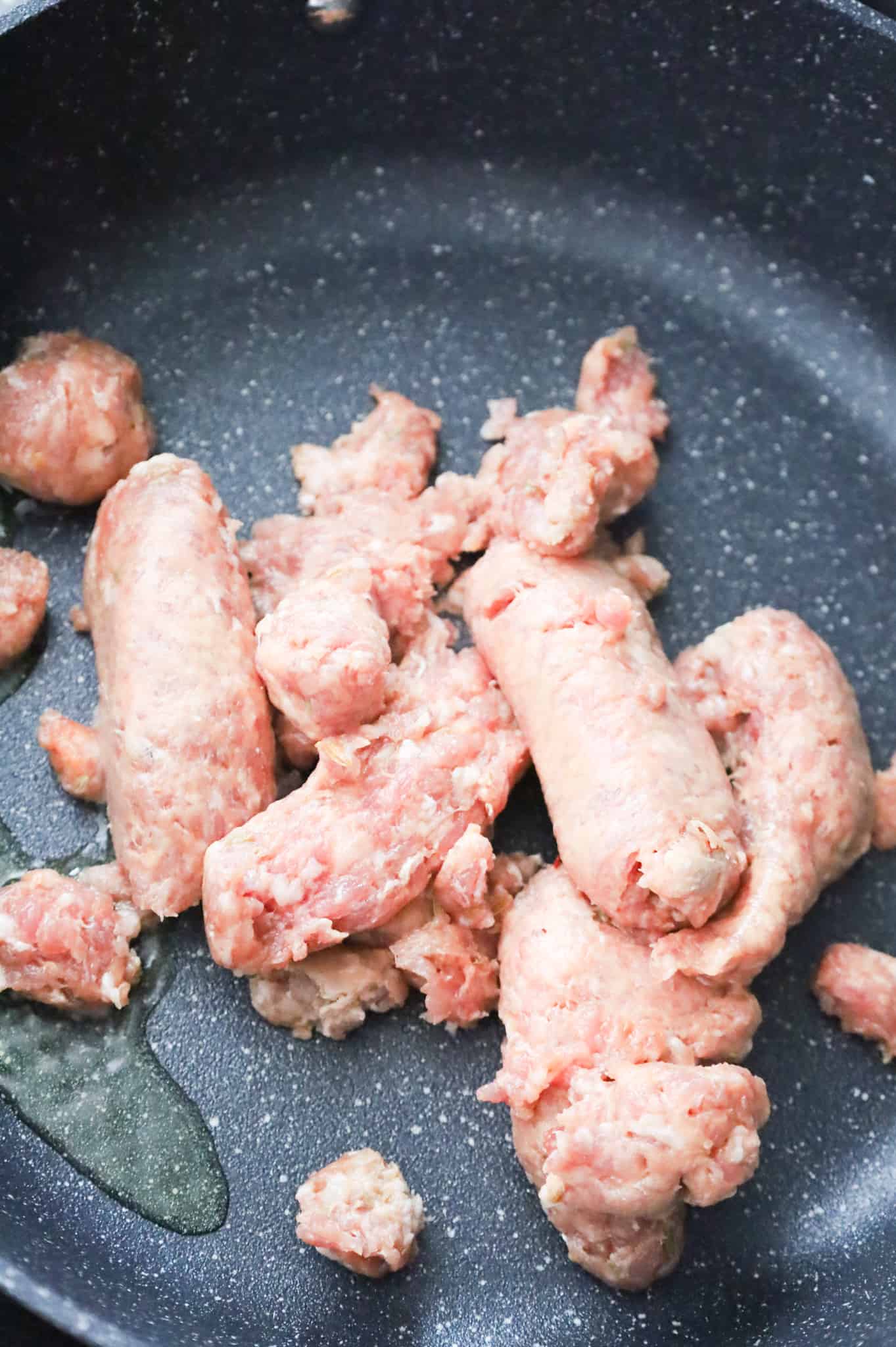 Italian sausage meat without casings in a skillet