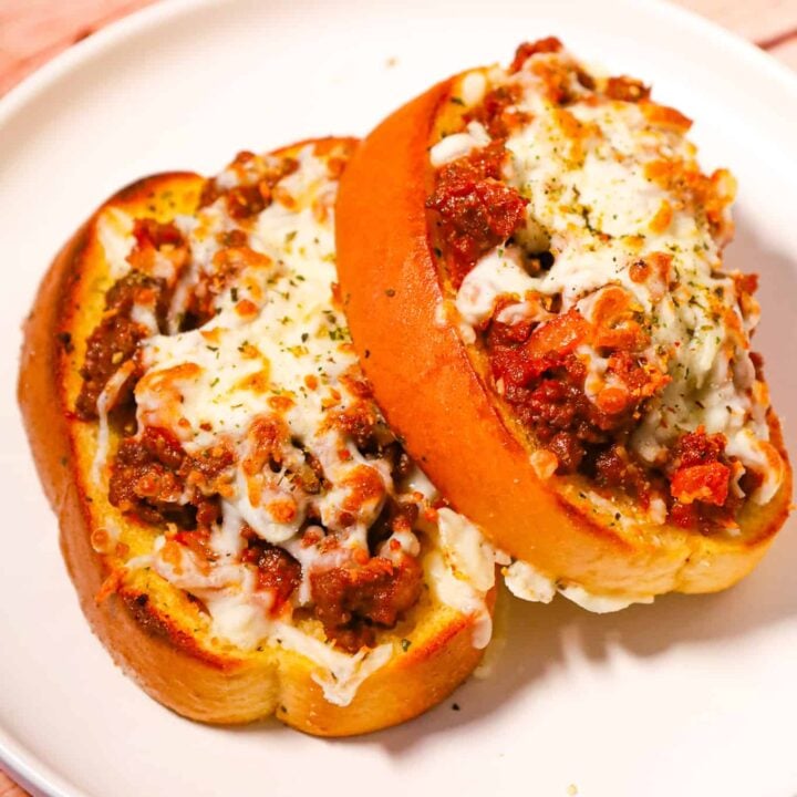 Texas Toast Sloppy Joes are an easy ground beef dinner recipe made with frozen Texas toast garlic bread slices and loaded with sloppy joe ground beef and shredded cheese.