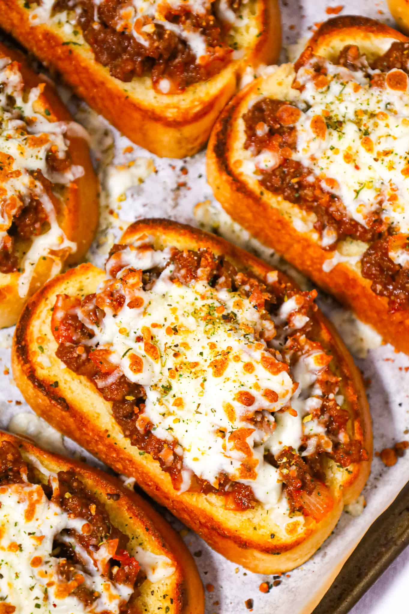 Texas Toast Sloppy Joes are an easy ground beef dinner recipe made with frozen Texas toast garlic bread slices and loaded with sloppy joe ground beef  and shredded cheese.