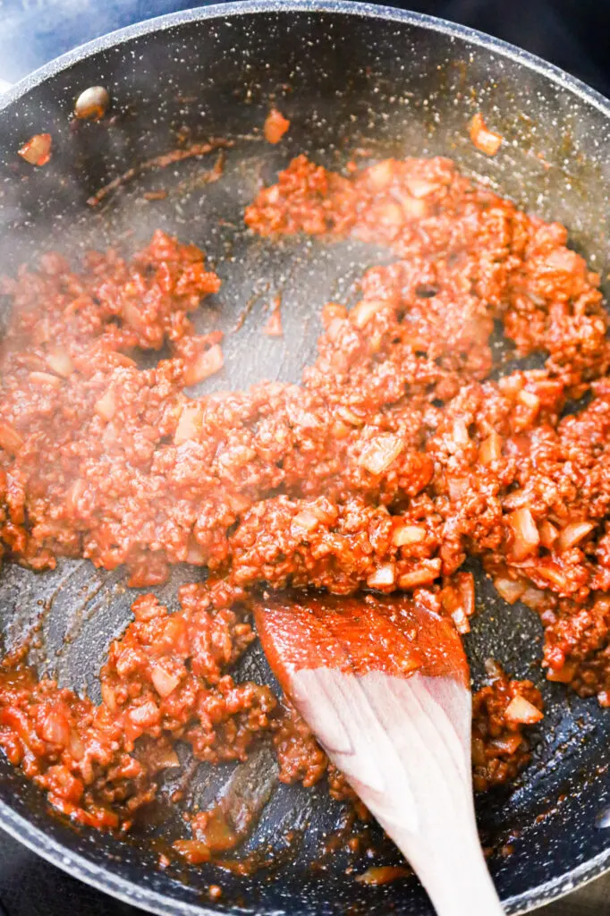ground beef and sloppy joe mixture in a skillet