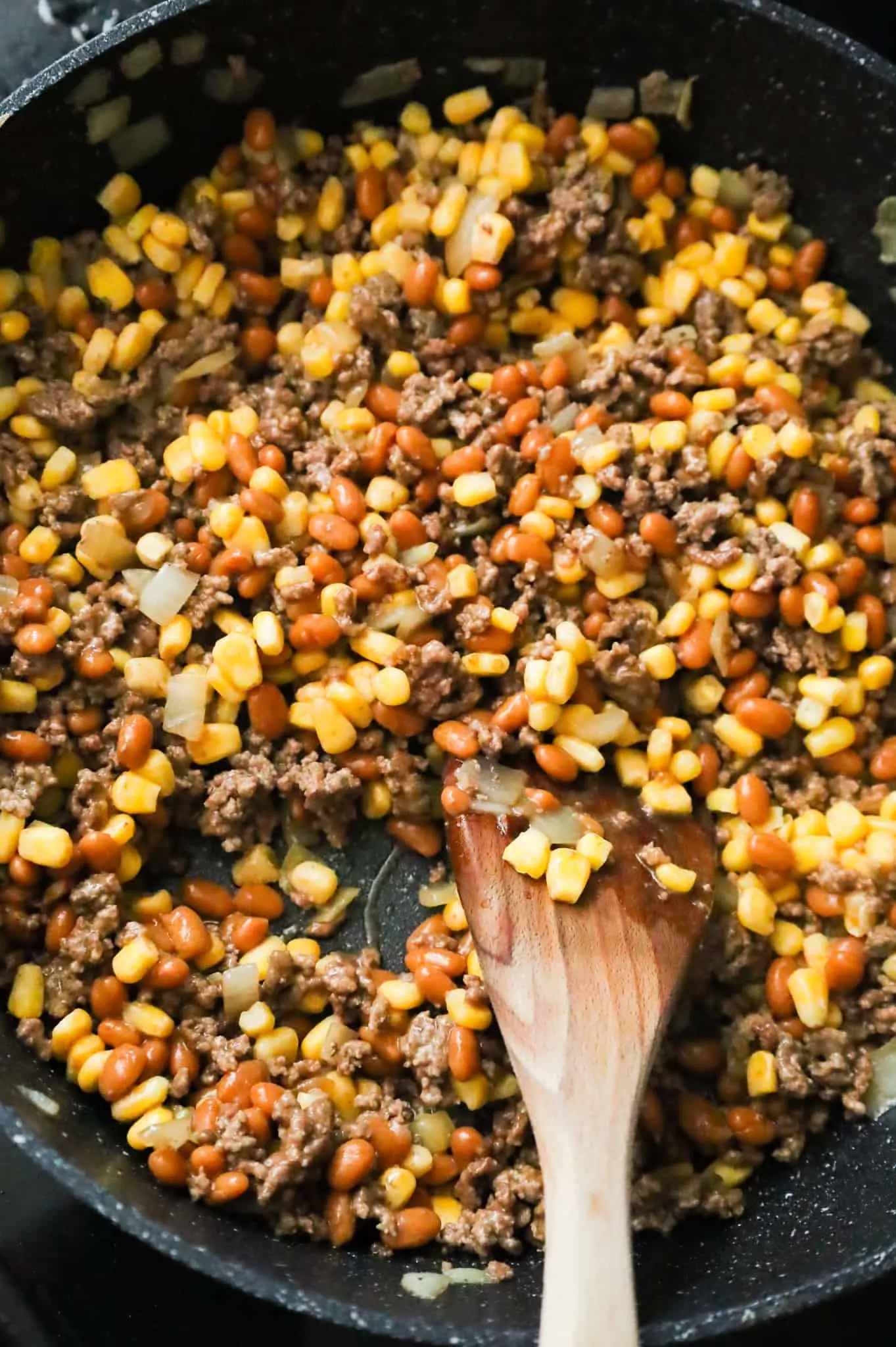 corn, beans and ground beef in a skillet