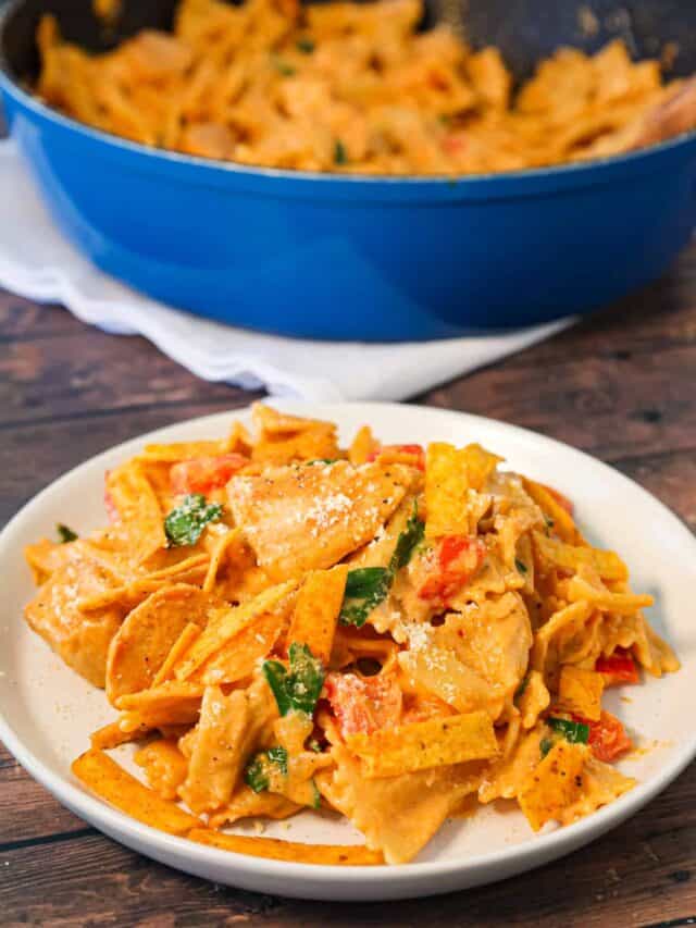 Spicy Chicken Chipotle Pasta is a delicious creamy pasta recipe loaded with diced peppers, parmesan cheese, chipotle pepper sauce and chicken breast chunks.
