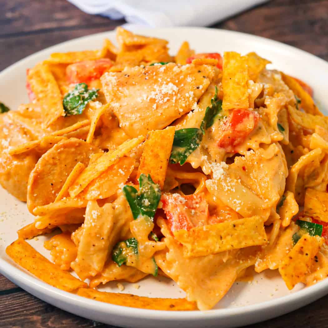 Spicy Chicken Chipotle Pasta is a delicious creamy pasta recipe loaded with diced peppers, parmesan cheese, chipotle pepper sauce and chicken breast chunks.