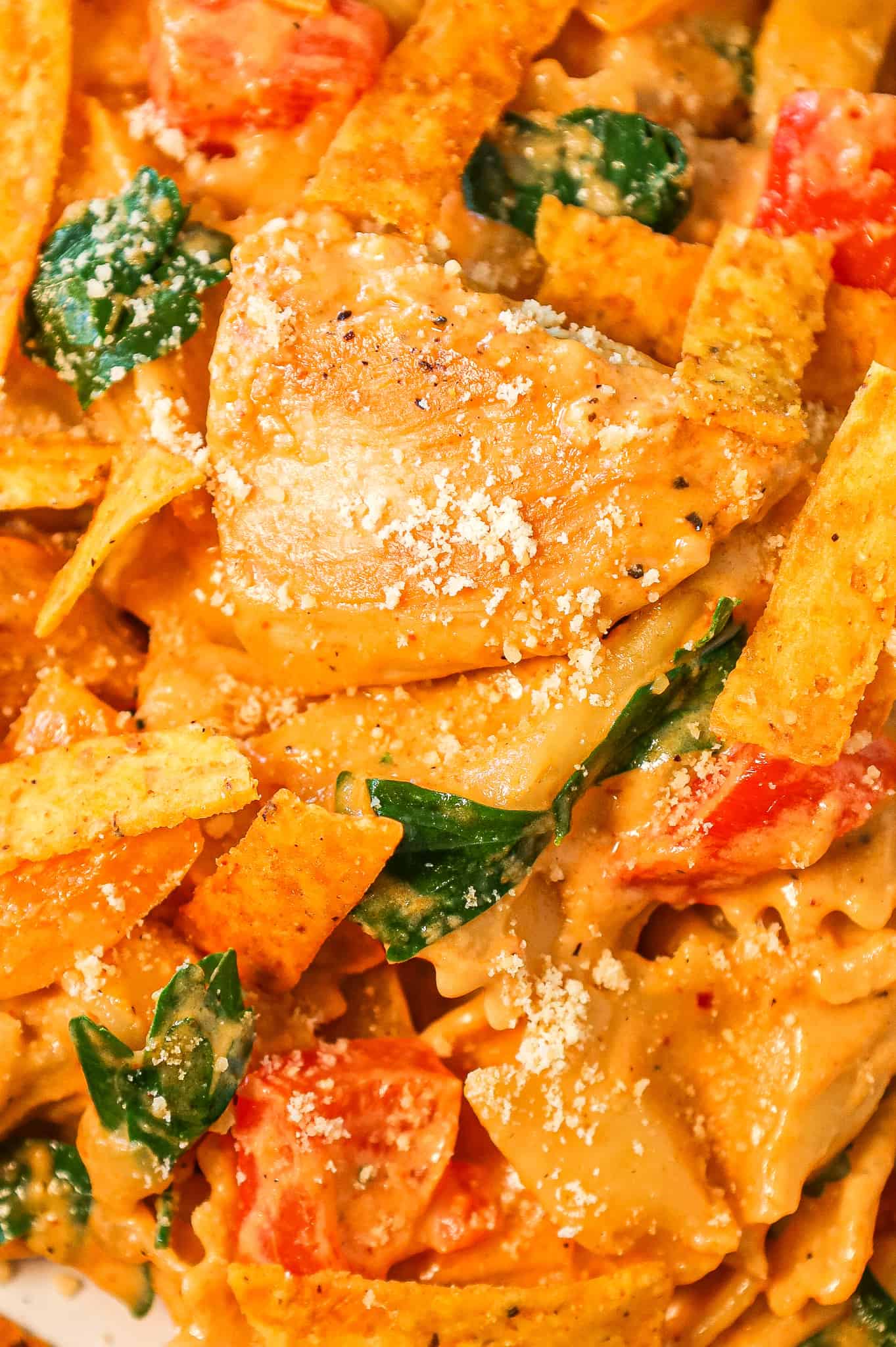 Spicy Chicken Chipotle Pasta is a delicious creamy pasta recipe loaded with diced peppers, parmesan cheese, chipotle pepper sauce and chicken breast chunks.