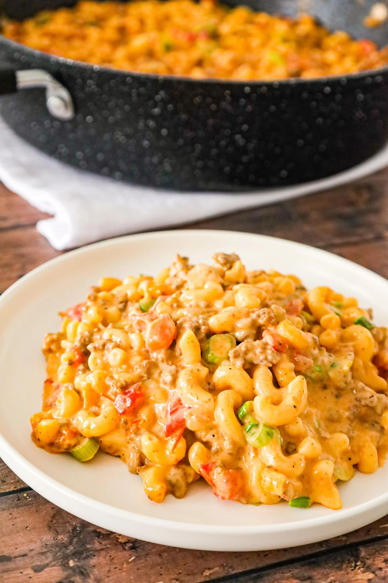 Taco Mac and Cheese is an easy pasta recipe loaded with ground beef, taco seasoning and Rotel diced tomatoes and tossed in a creamy cheese sauce.