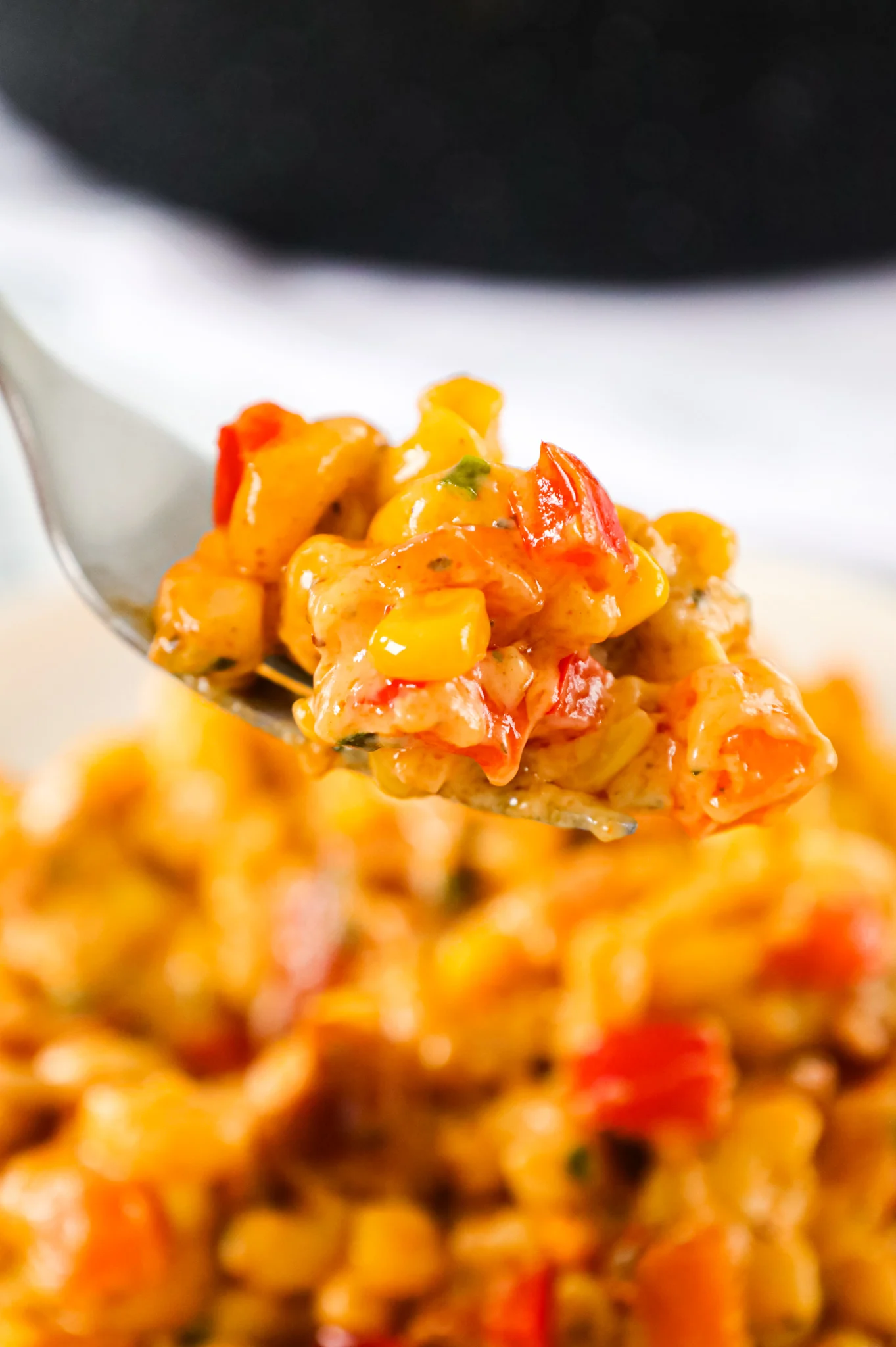 Cajun Mac and Cheese is a flavourful pasta recipe loaded with bacon, sweet potato, red bell peppers, Cajun seasoning, cheddar and Monterey Jack.
