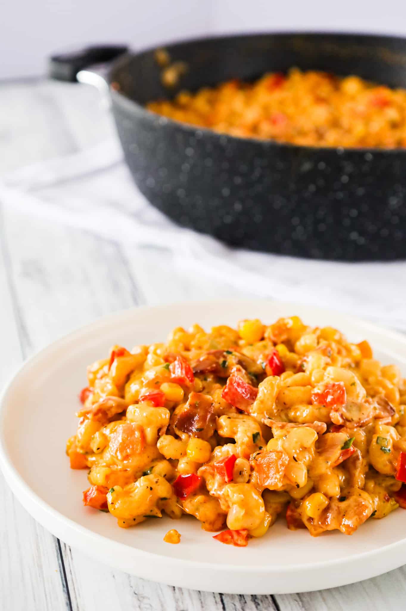 Cajun Mac and Cheese is a flavourful pasta recipe loaded with bacon, sweet potato, red bell peppers, Cajun seasoning, cheddar and Monterey Jack.