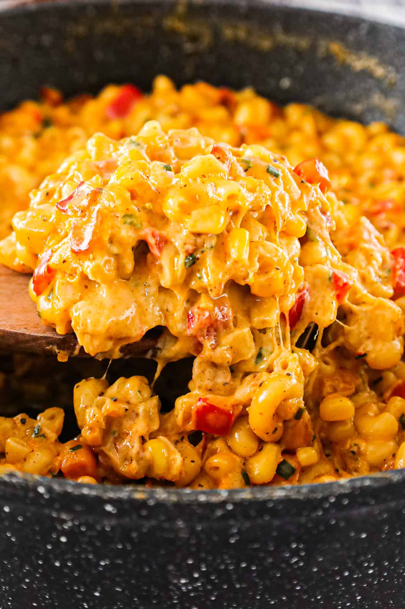 Cajun Mac and Cheese is a flavourful pasta recipe loaded with bacon, sweet potato, red bell peppers, Cajun seasoning, cheddar and Monterey Jack.