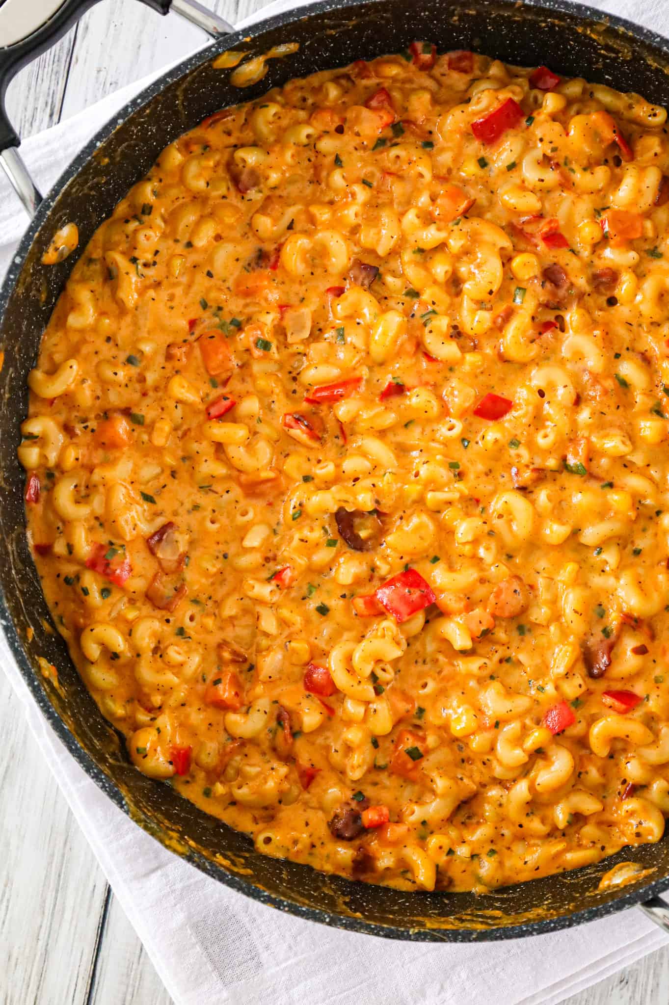 Cajun Mac and Cheese is a flavourful pasta recipe loaded with bacon, sweet potato, red bell peppers, Cajun seasoning, cheddar and Monterey Jack.