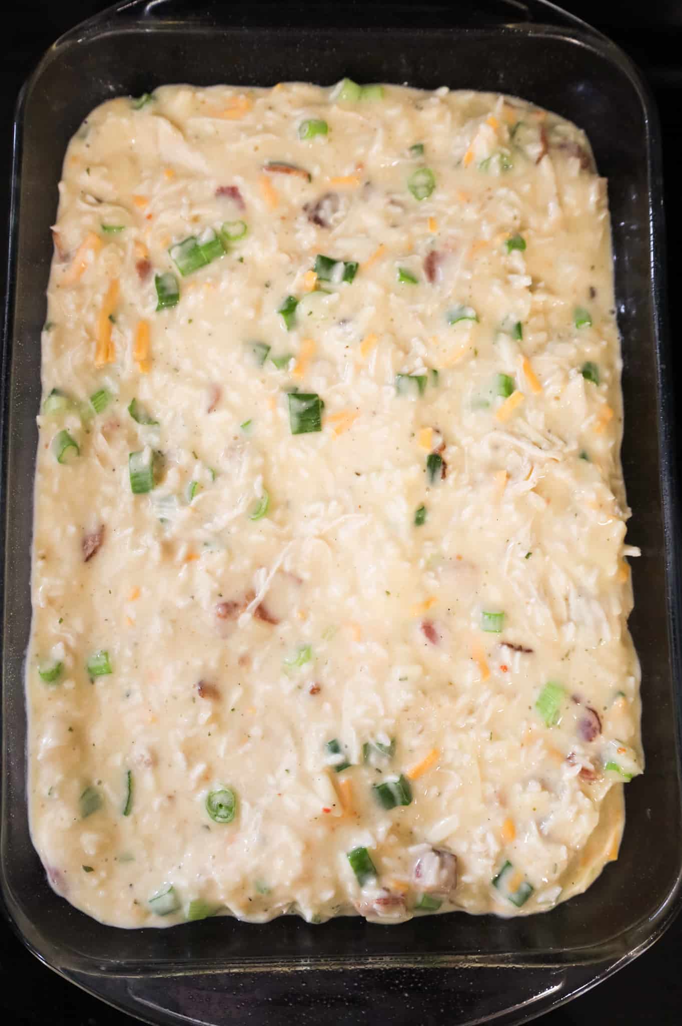 chicken bacon ranch rice mixture in a baking dish