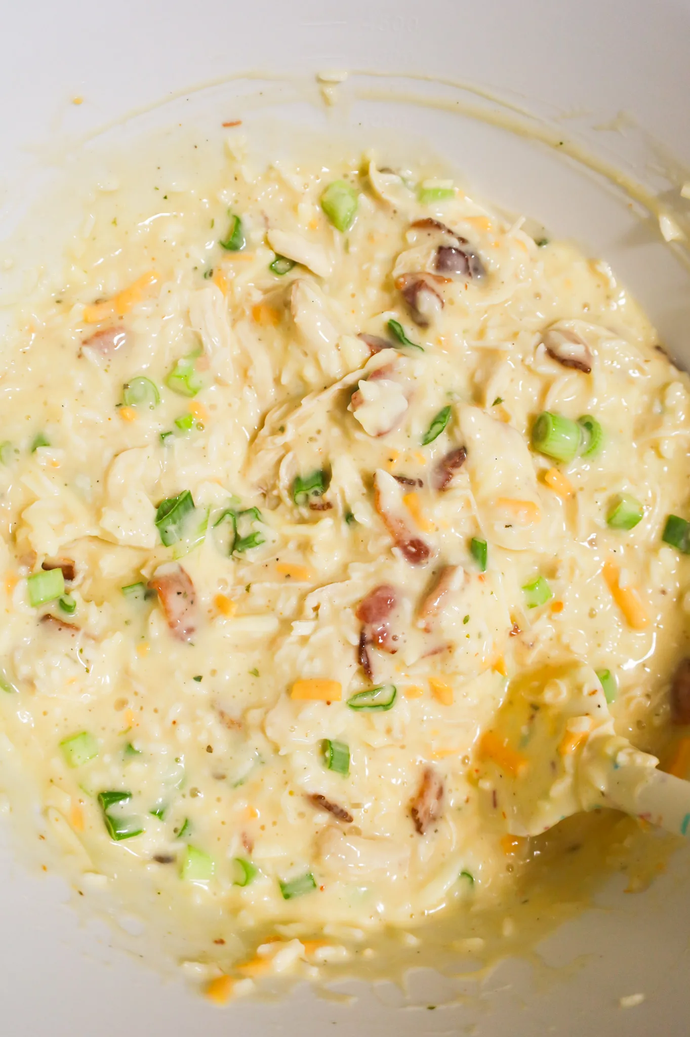 chicken bacon ranch rice mixture in a mixing bowl