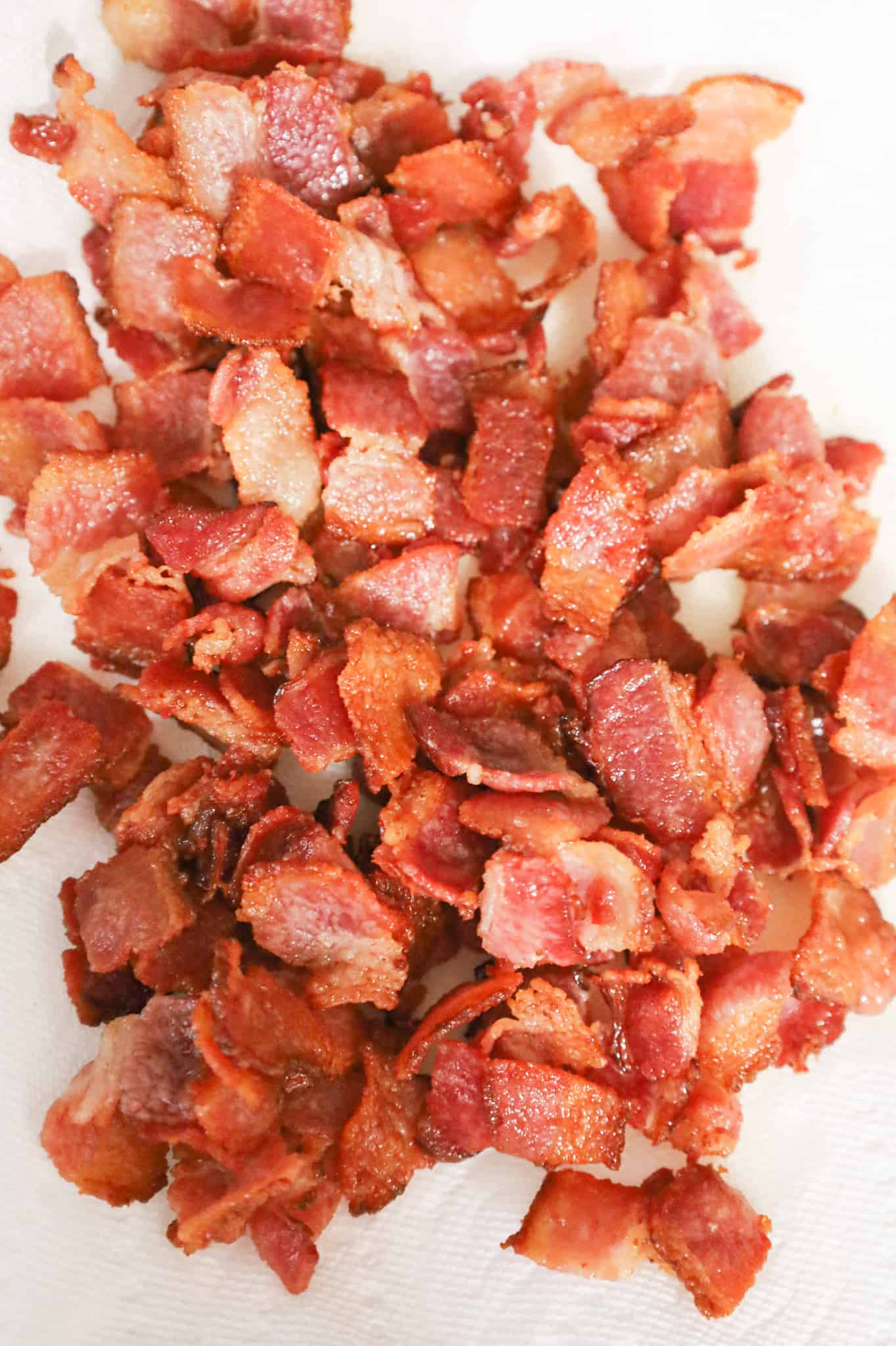 cook bacon pieces on a paper towel lined plate