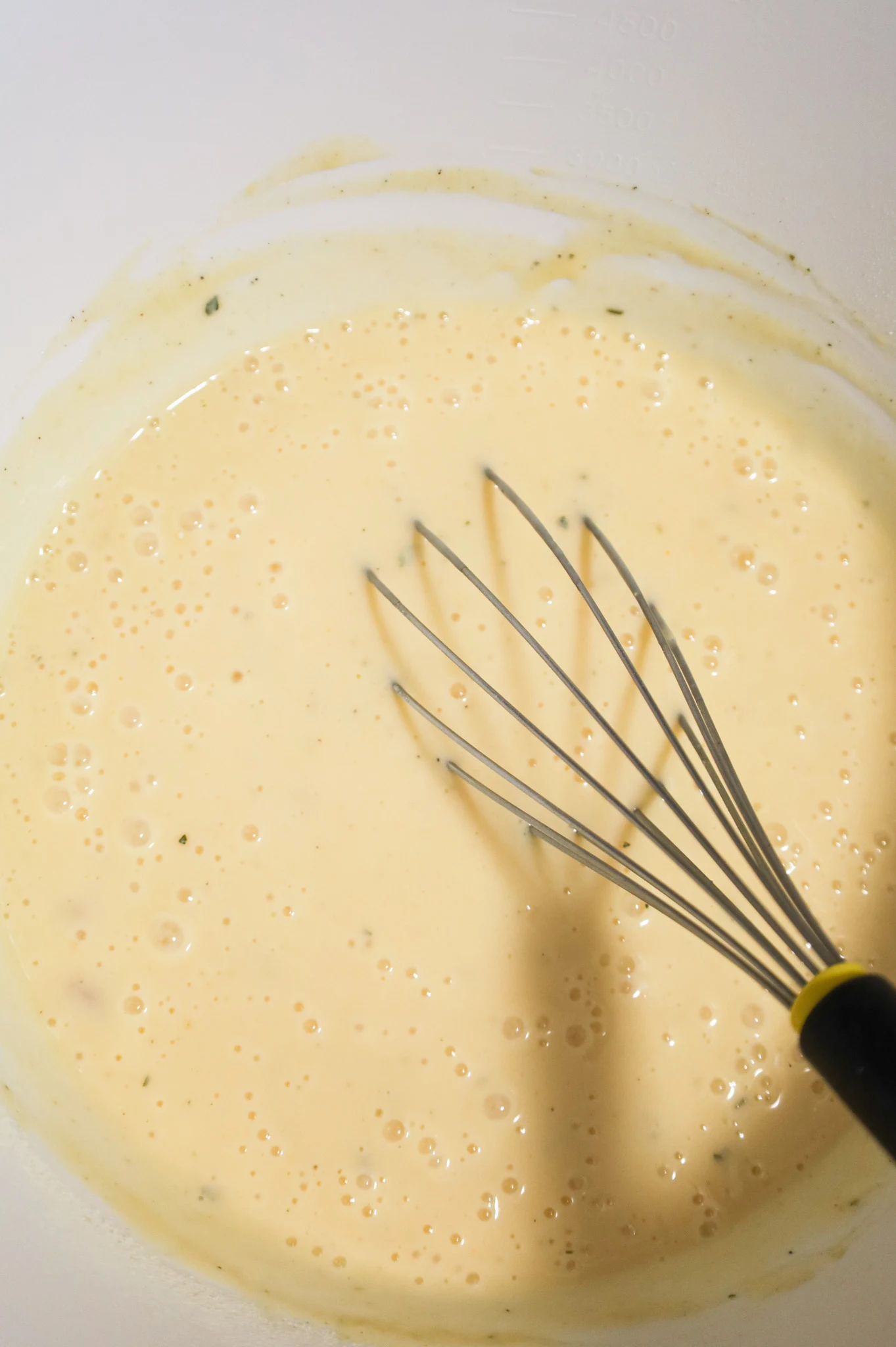 cream soup, milk and ranch dressing mix in a mixing bowl