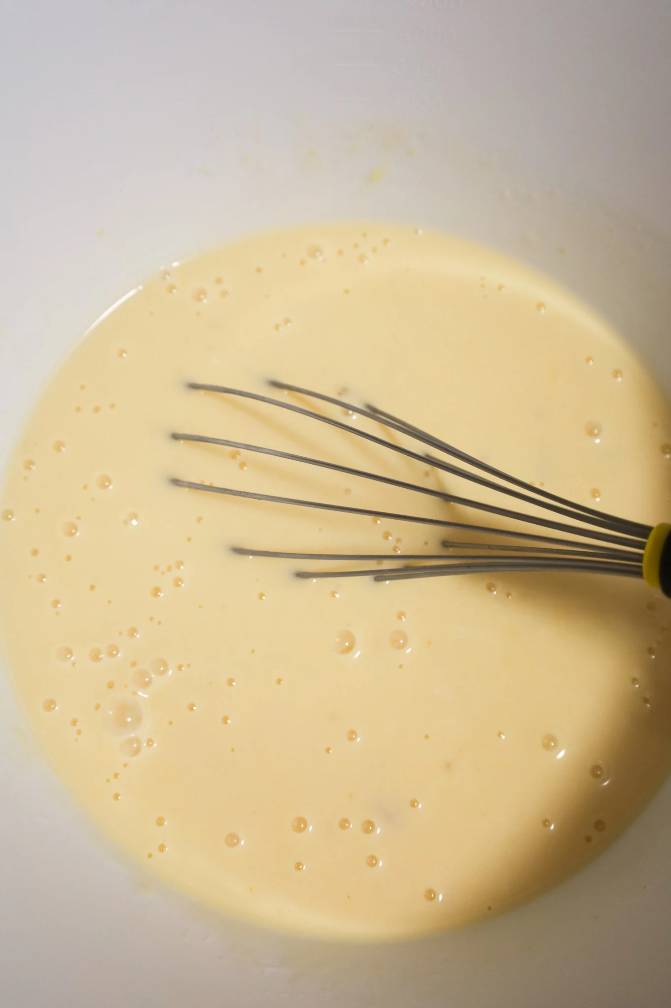 cream soup and milk mixture in a mixing bowl