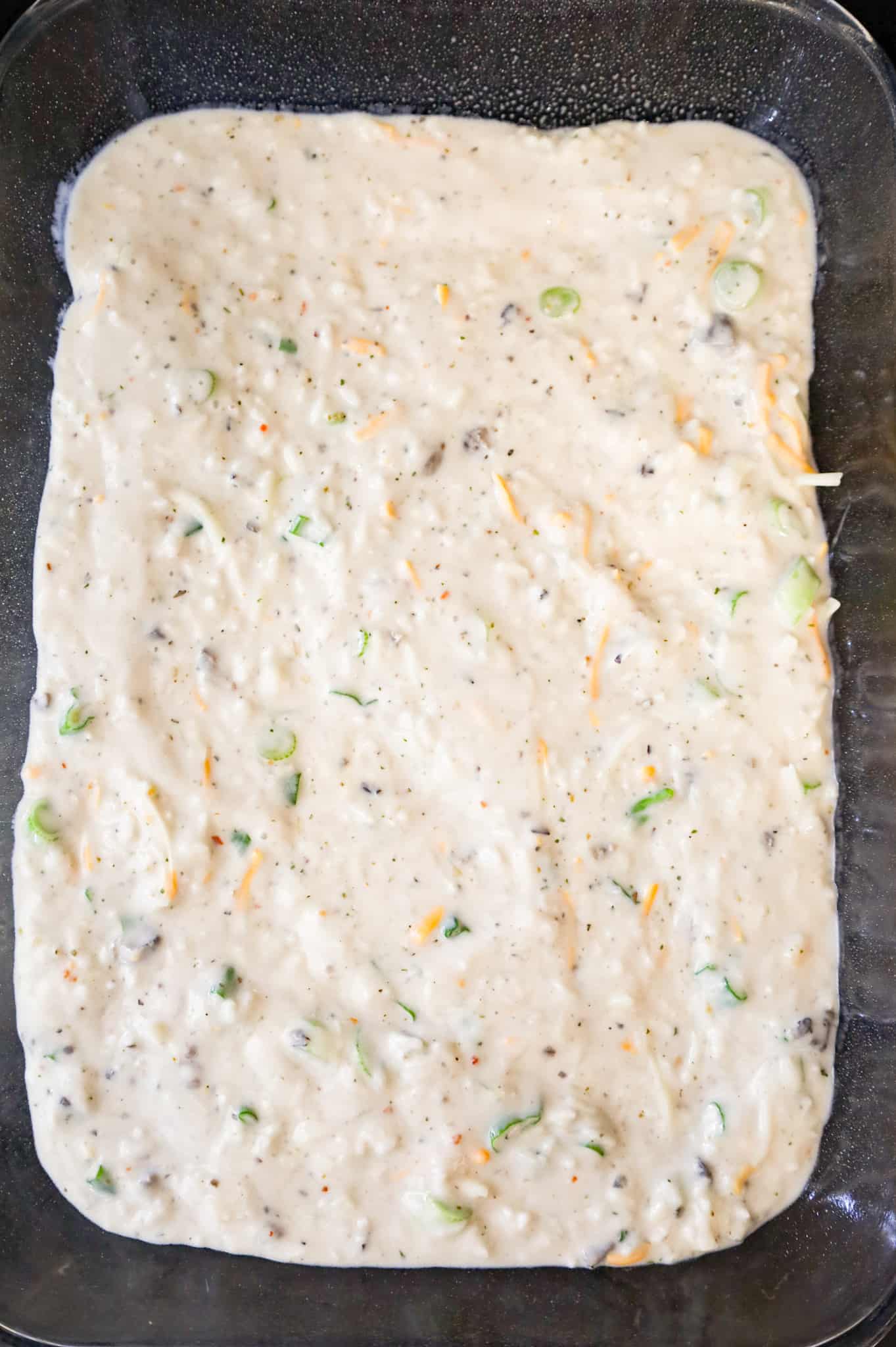 creamy rice mixture in a baking dish