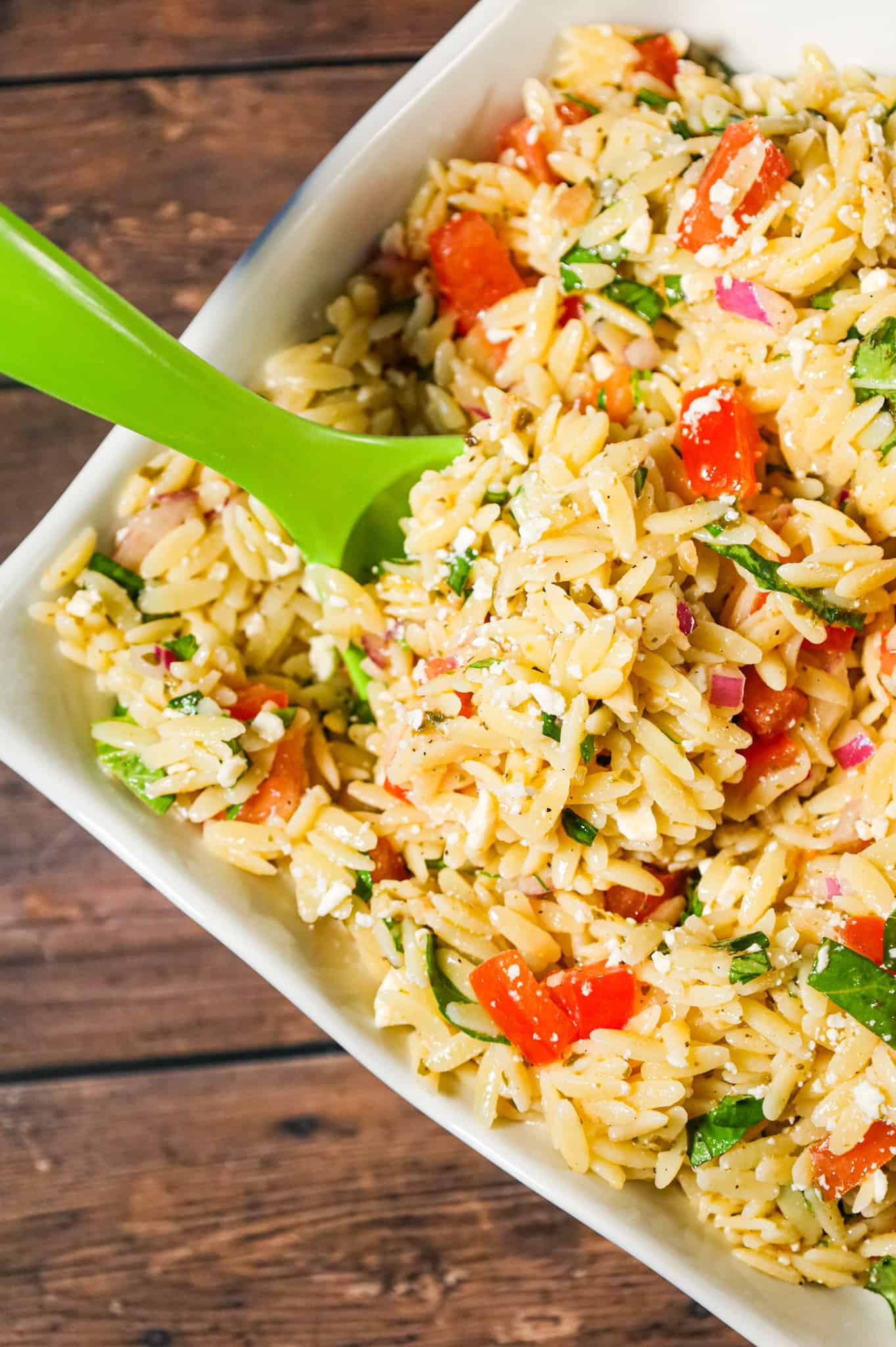 Bruschetta Orzo Pasta Salad is a tasty side dish recipe loaded with fresh diced tomatoes, red onions, fresh basil, garlic and feta cheese.