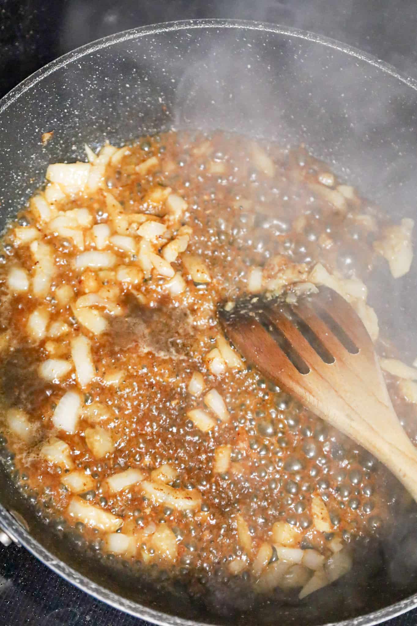 marsala wine added to skillet with diced onions