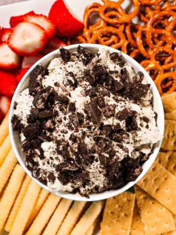 Oreo Dip is an easy no bake dessert recipe made with cream cheese, Cool Whip, powdered sugar and loaded with crumbled Oreo cookies.