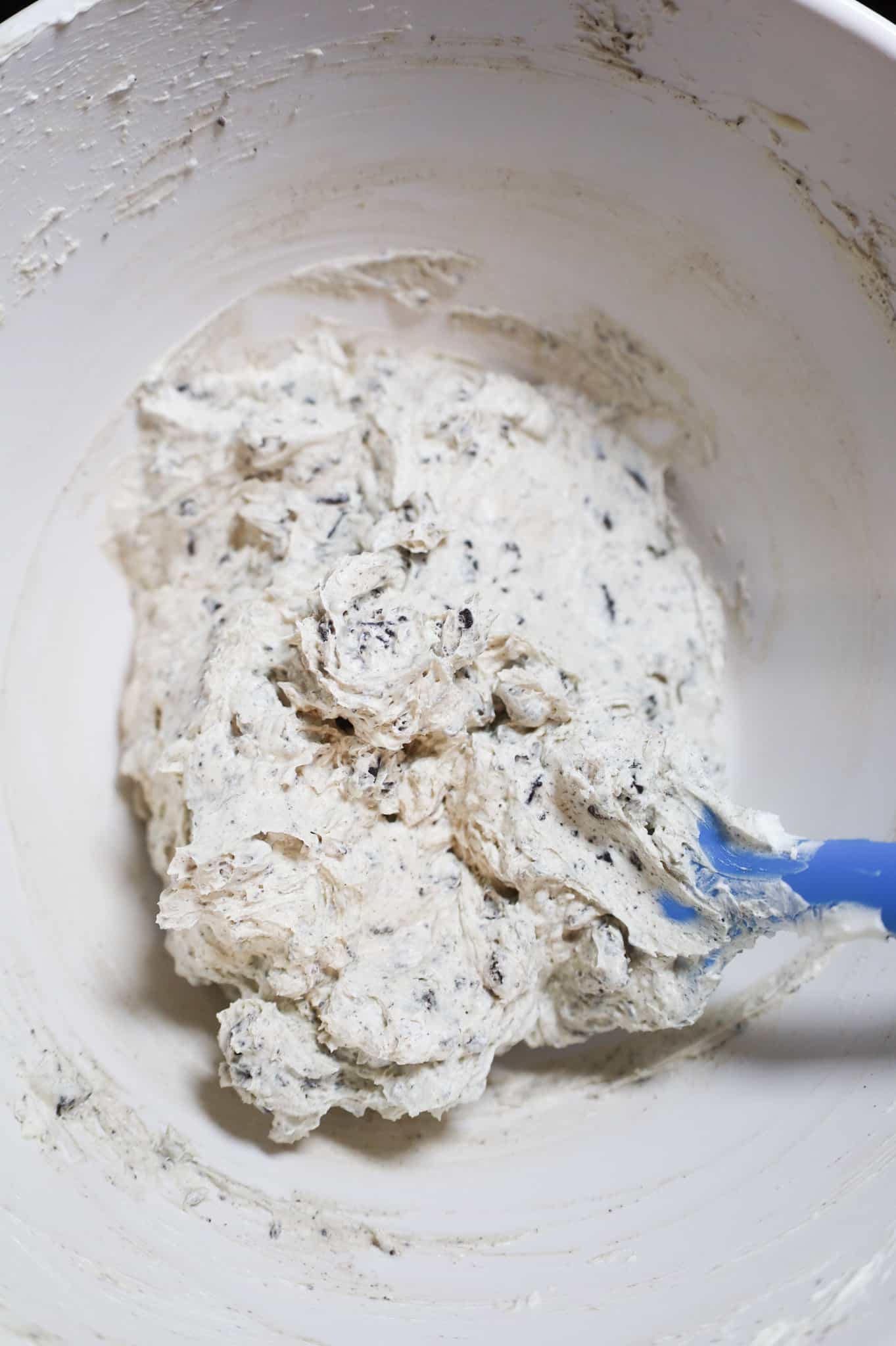 crushed Oreo, cream cheese and cool whip mixture in a mixing bowl