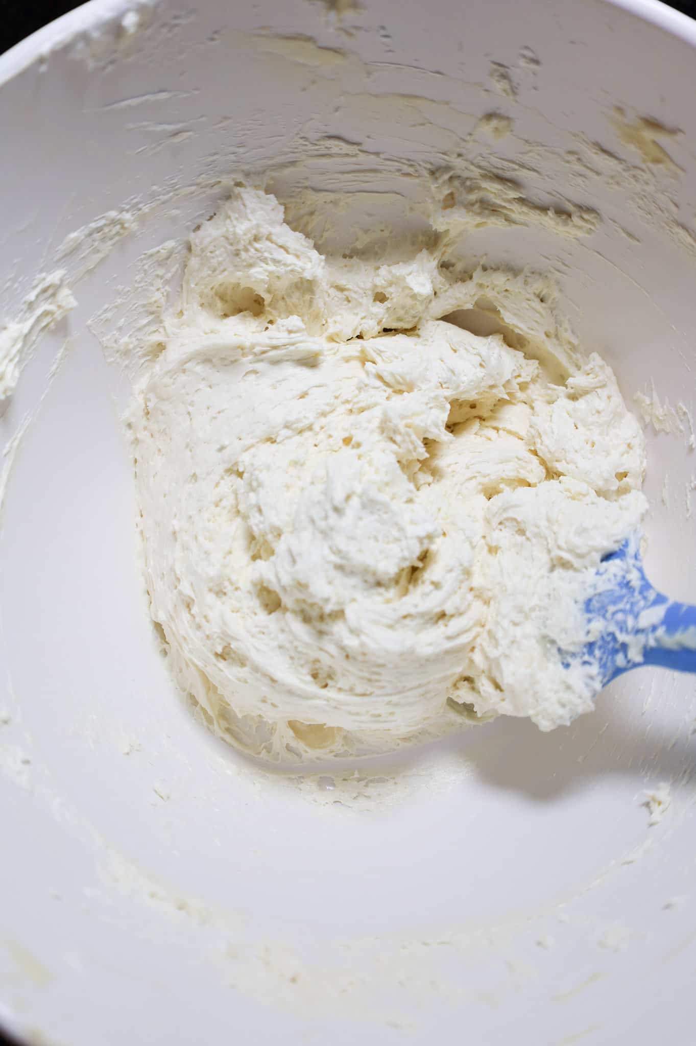 cream cheese and cool whip mixture in a mixing bowl