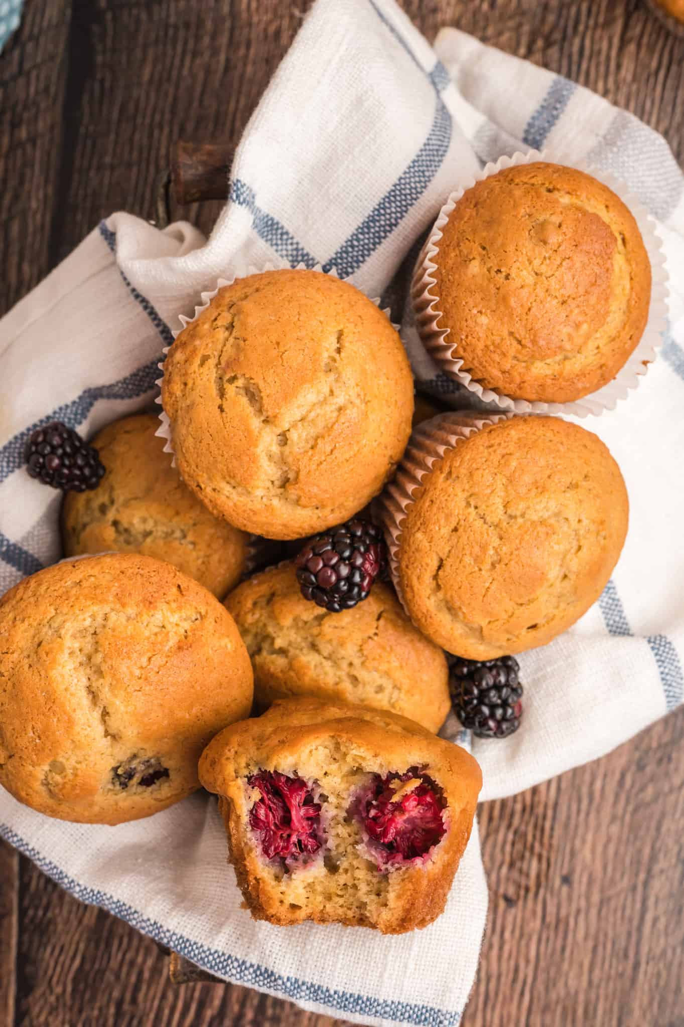 Blackberry Muffins are the perfect snack or breakfast food. These tasty muffins are seasoned with cinnamon and loaded with fresh blackberries.