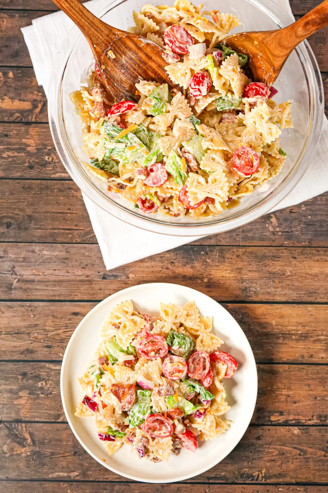 BLT Pasta Salad is a delicious cold side dish recipe made with bowtie pasta and loaded with chopped bacon, grape tomatoes, red onions and shredded cheese.