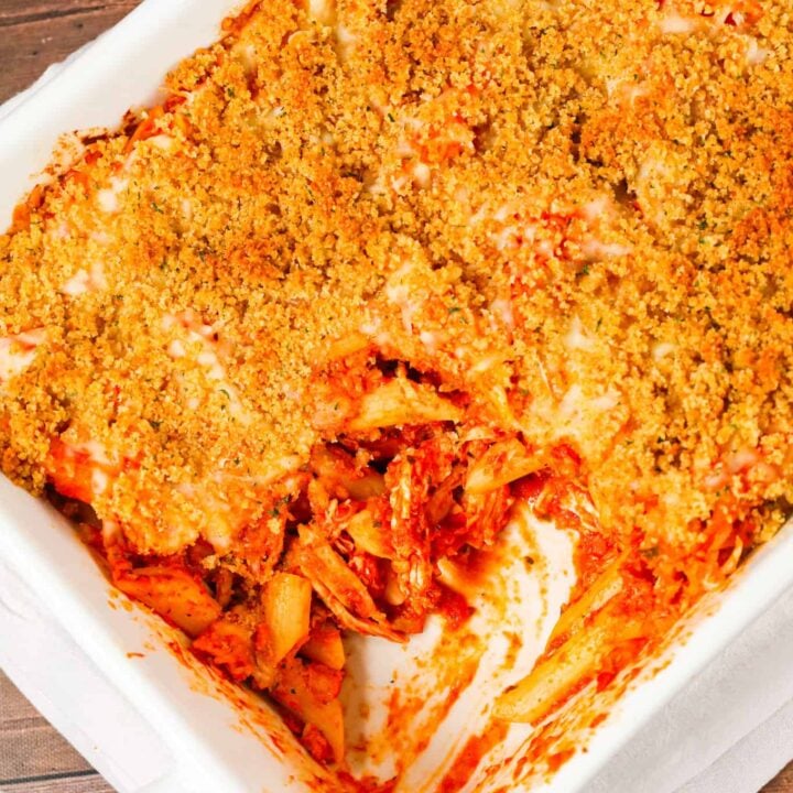 Chicken Parmesan Pasta is an easy baked pasta recipe loaded with shredded chicken, marinara sauce, mozzarella, parmesan cheese and topped with Italian seasoned bread crumbs.