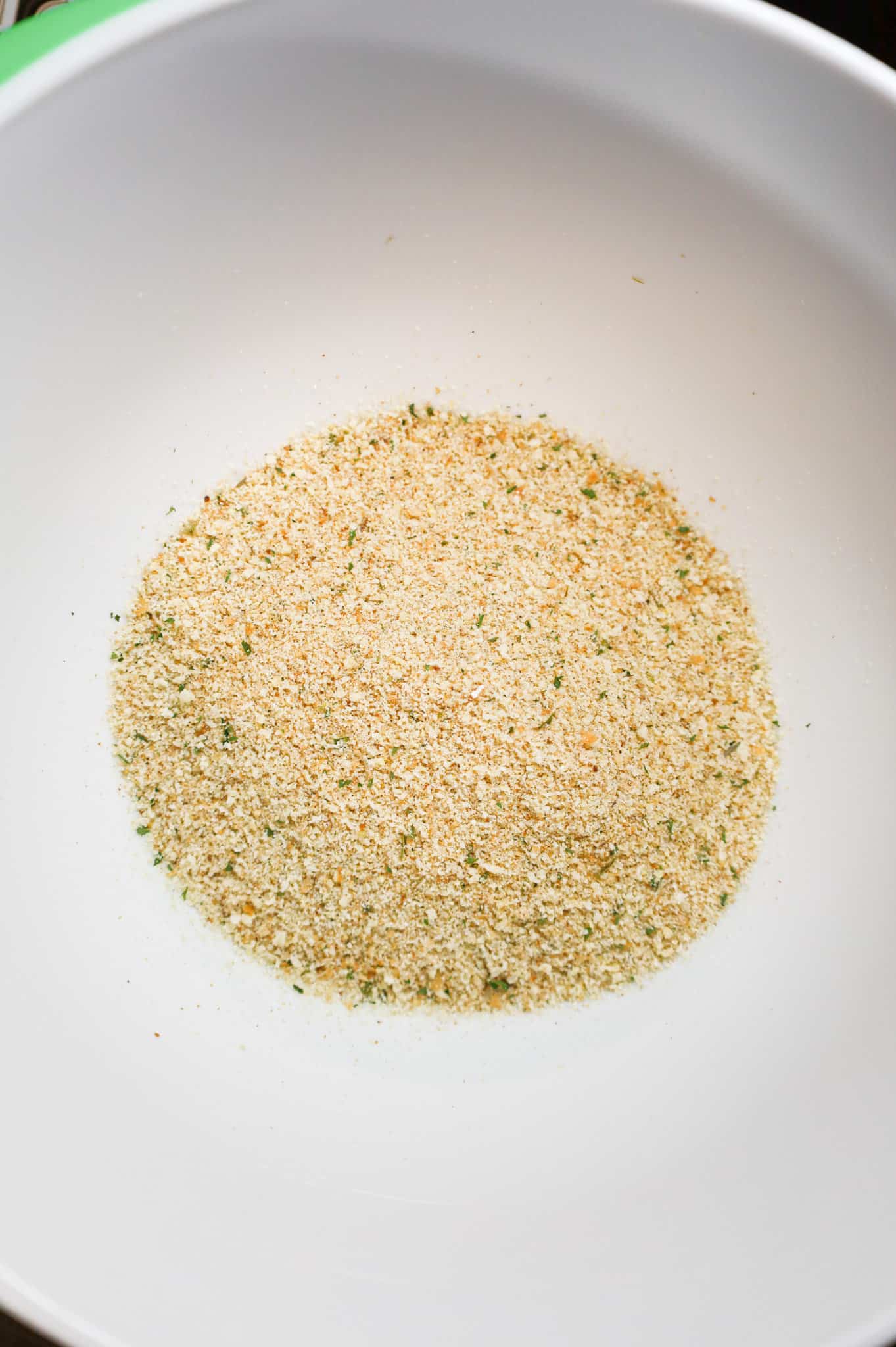 Italian seasoned bread crumbs in a mixing bowl