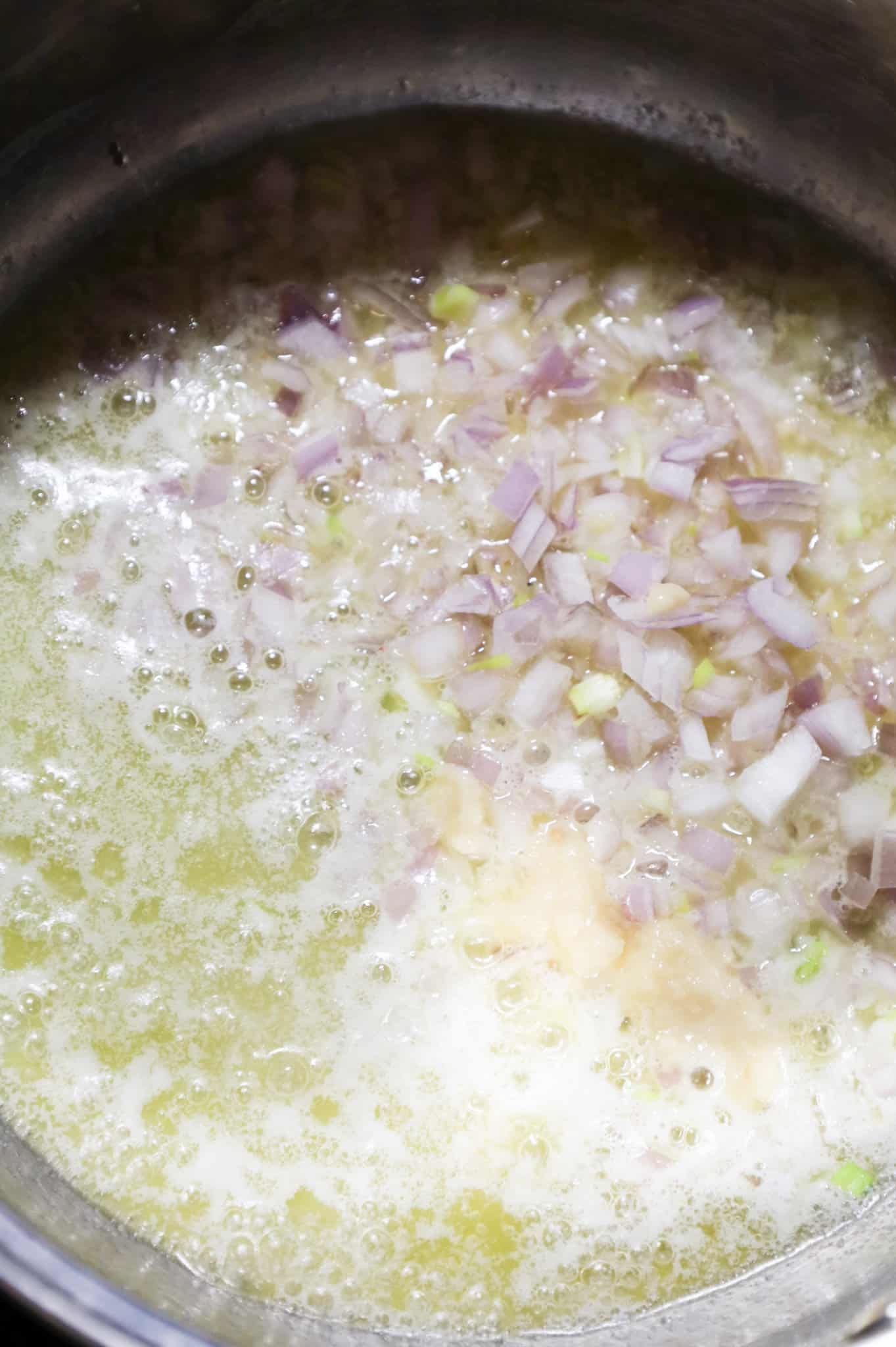 garlic puree, minced shallots and melted butter in a saucepan