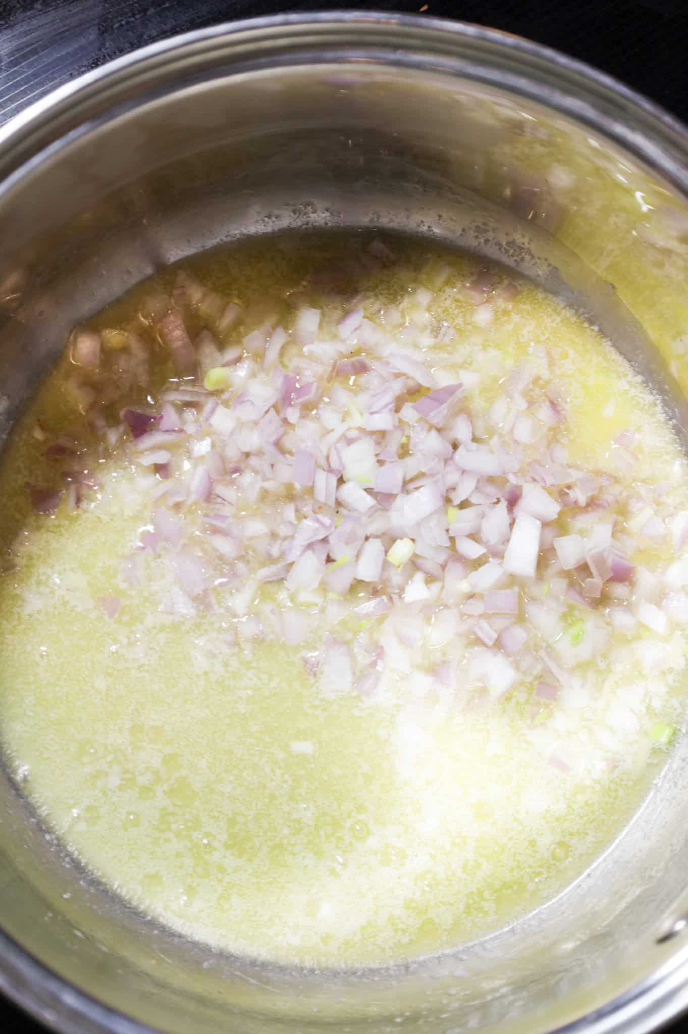 minced shallots in a saucepan with melted butter