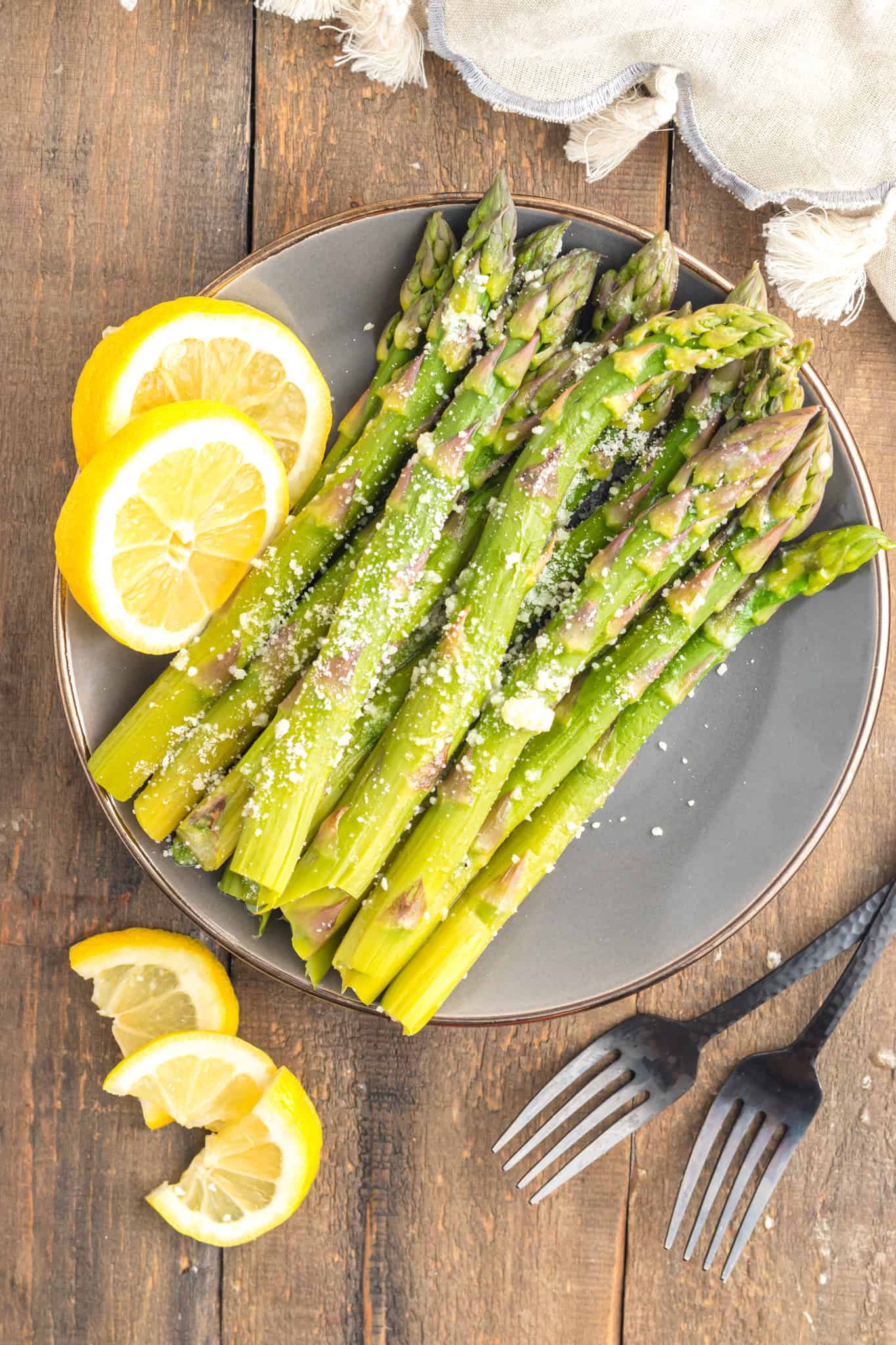 Instant Pot Asparagus has the perfect firm texture and can be deliciously seasoned with an optional garlic butter sauce, a squeeze of lemon, and a sprinkle of parmesan cheese. 