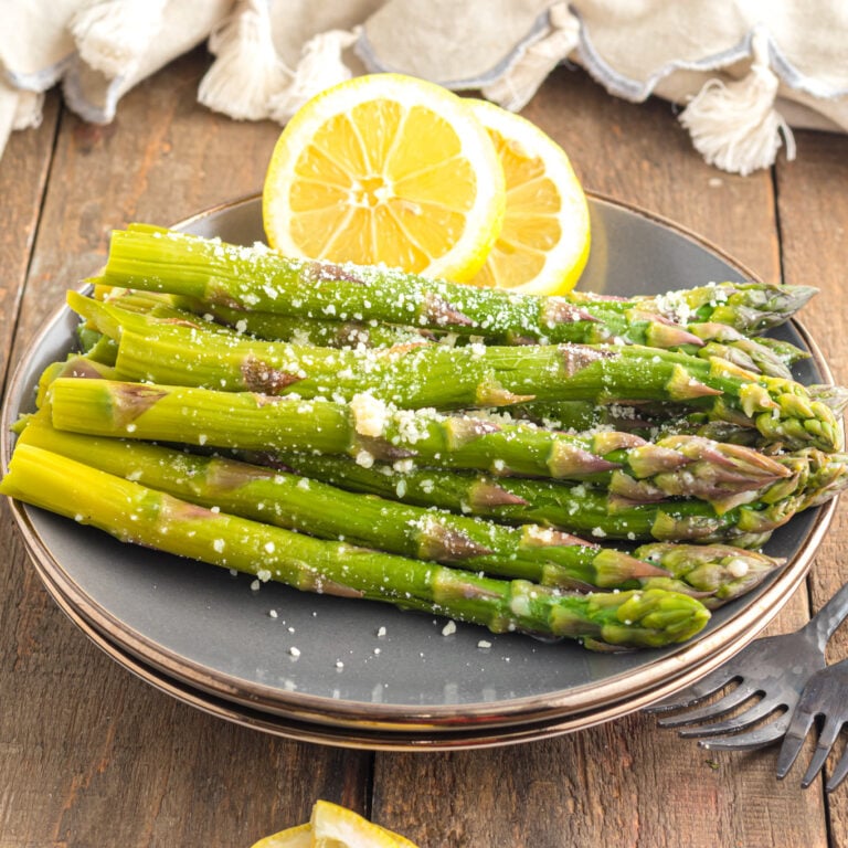 Instant Pot Asparagus has the perfect firm texture and can be deliciously seasoned with an optional garlic butter sauce, a squeeze of lemon, and a sprinkle of parmesan cheese. 