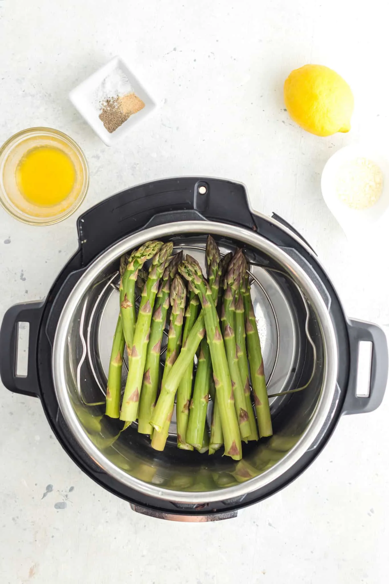 asparagus on a trivet in an instant pot