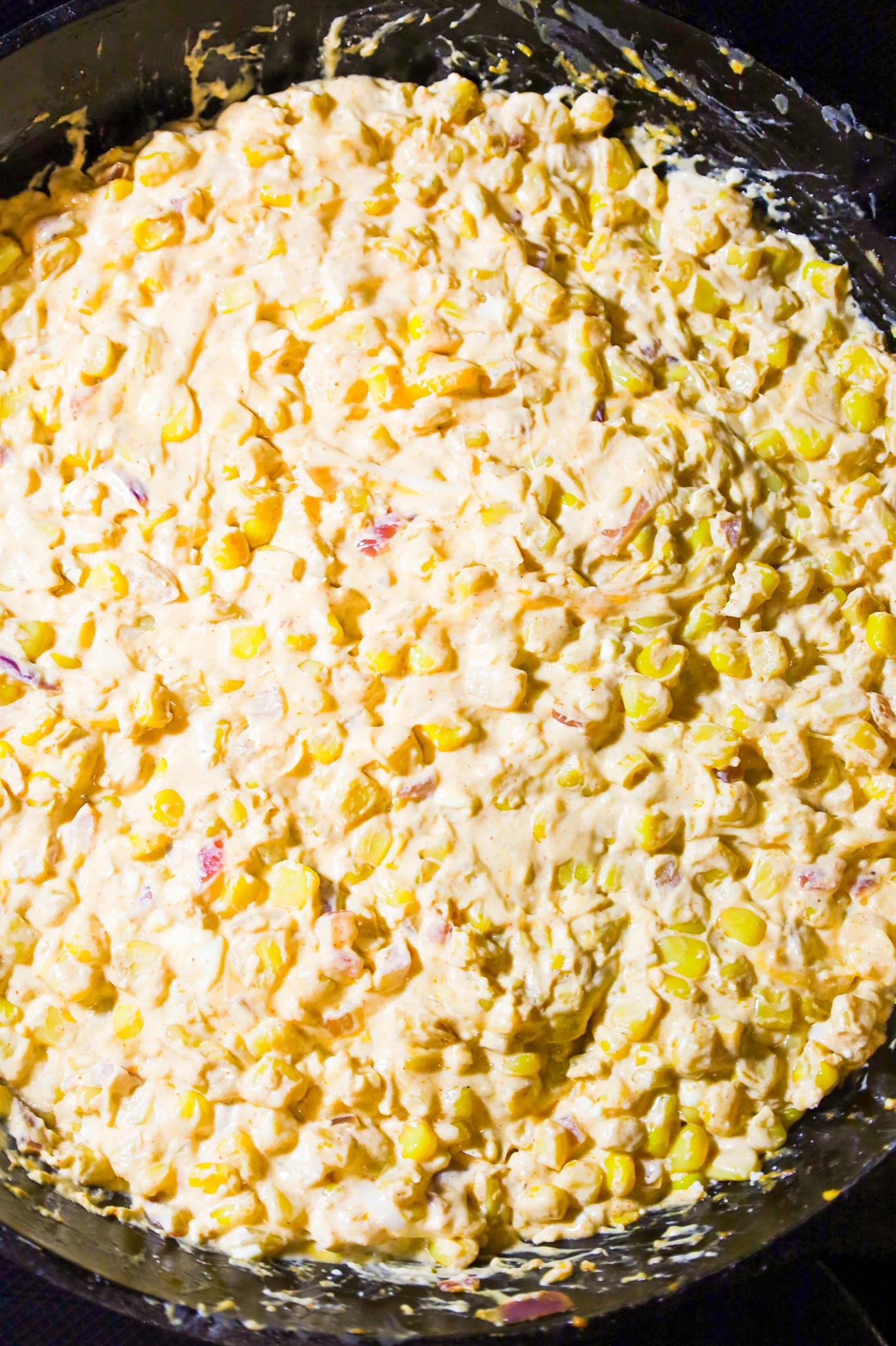 creamy corn mixture in a skillet