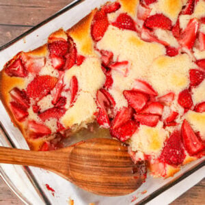 Strawberry Cobbler is an easy and delicious dessert recipe made with fresh strawberries baked in a delicious vanilla cake like batter.