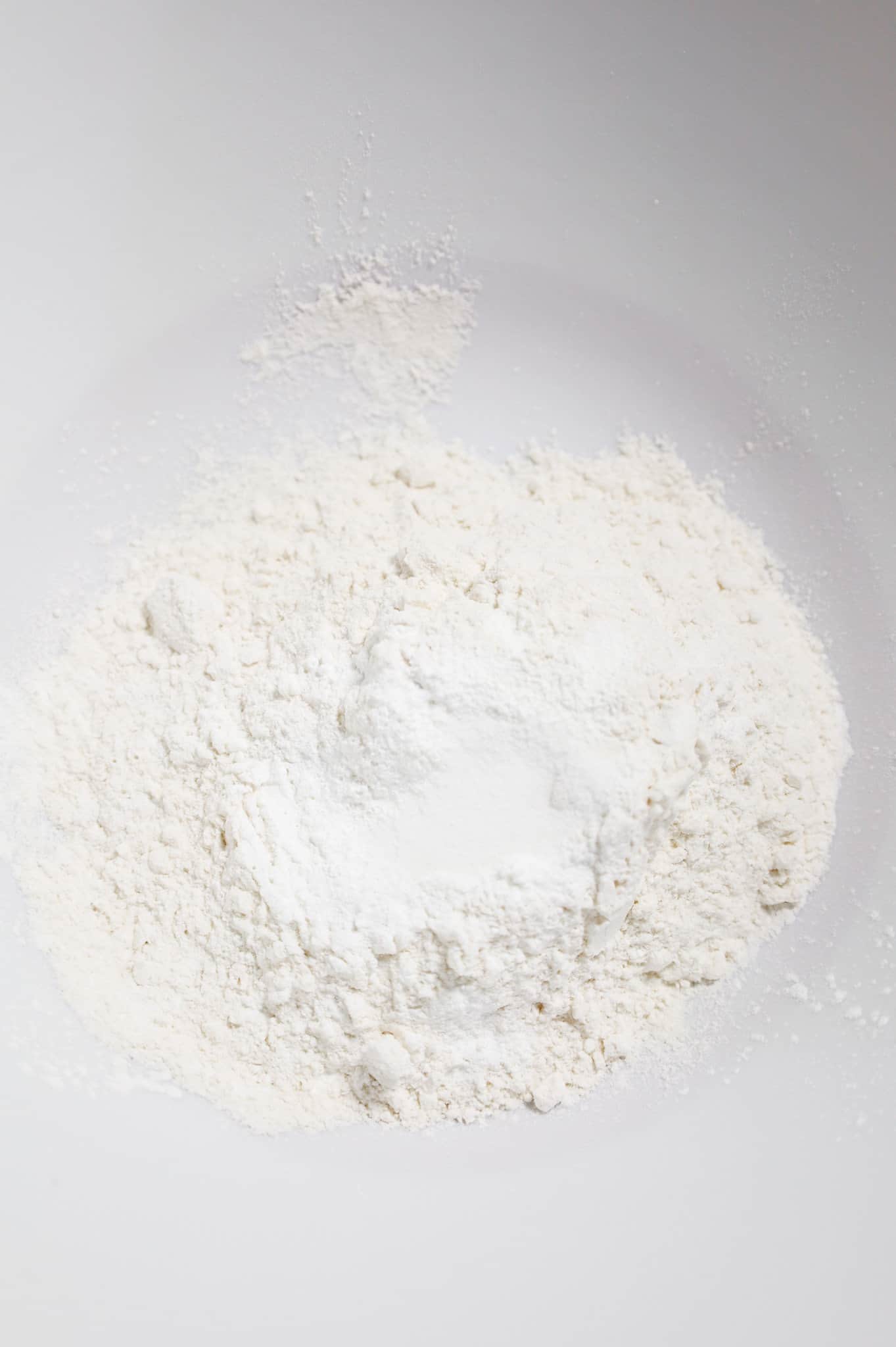 flour and baking powder in a mixing bowl