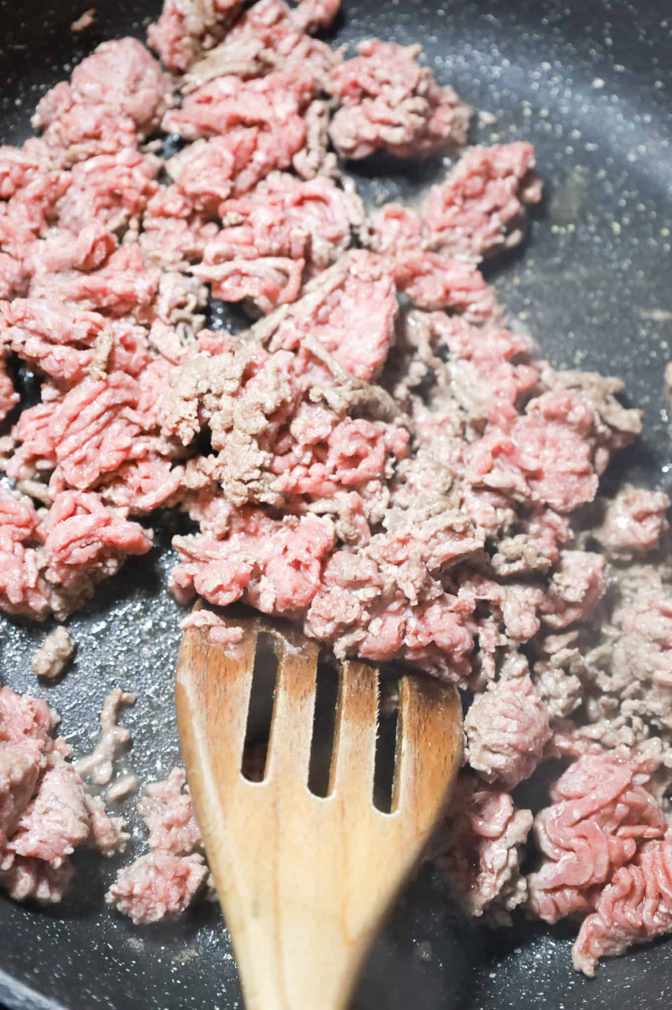 lean ground beef being cooked in a skillet