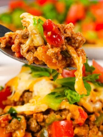 Taco Pie is an easy weeknight dinner recipe using a store bought pie crust loaded with ground beef, green peppers, Rotel and cheese.