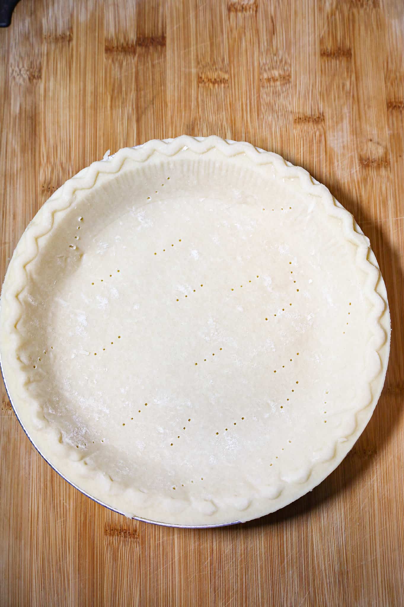 raw pie crust in a pie plate