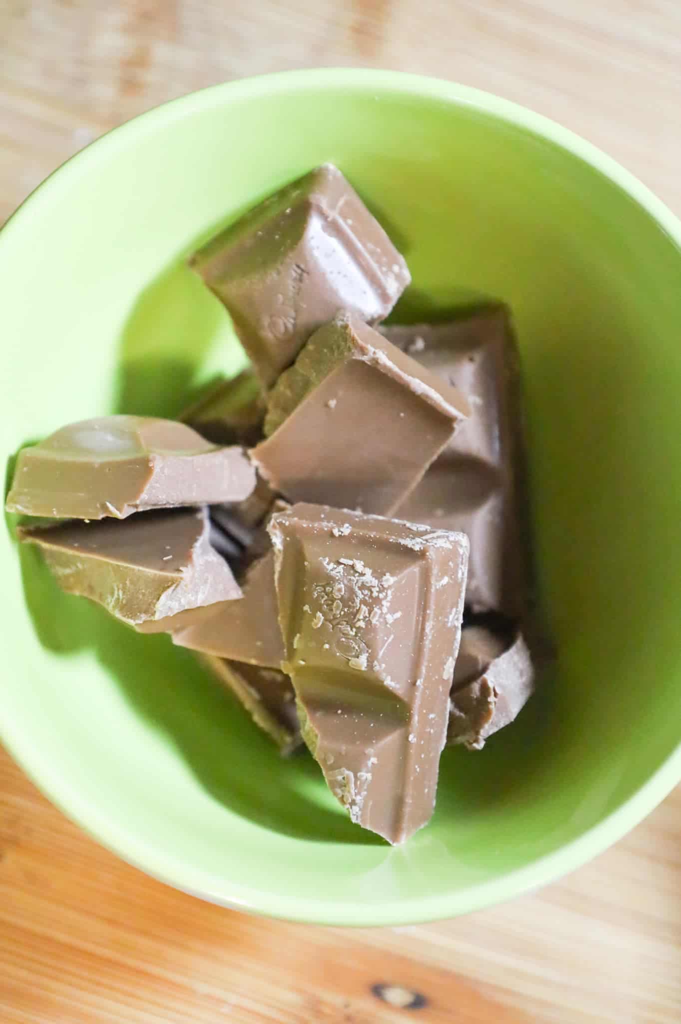 milk chocolate squares in a small bowl