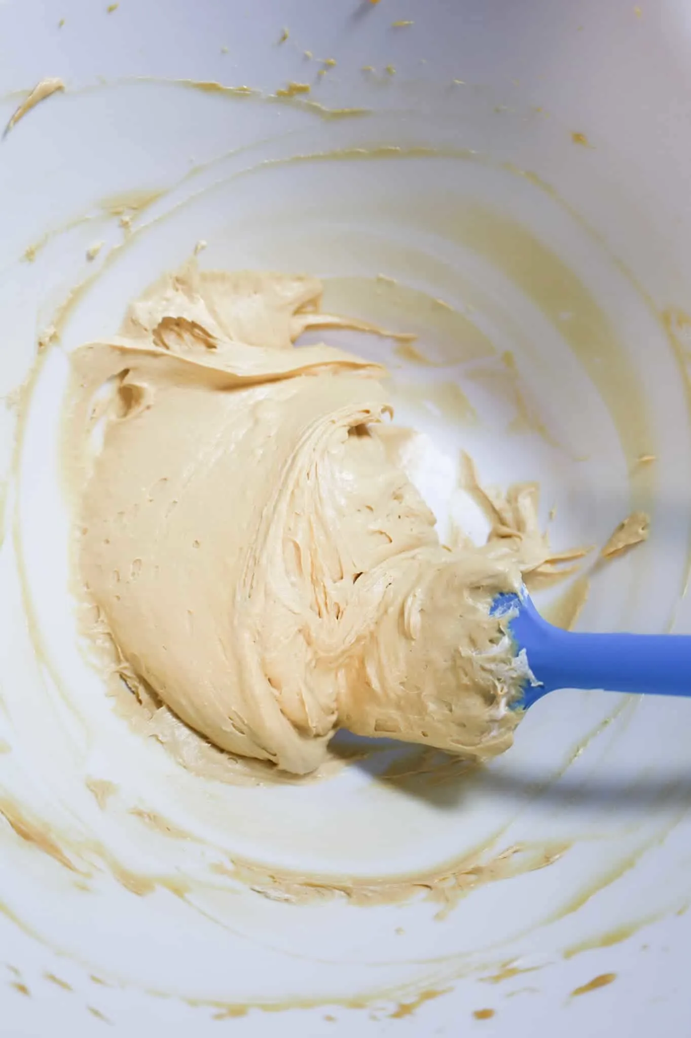 cream cheese, dulce de leche , cool whip and brown sugar mixture in a mixing bowl