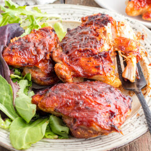 Air Fryer BBQ Chicken Thighs are juicy seasoned chicken thighs brushed with your favourite BBQ sauce that can be ready in under half an hour.