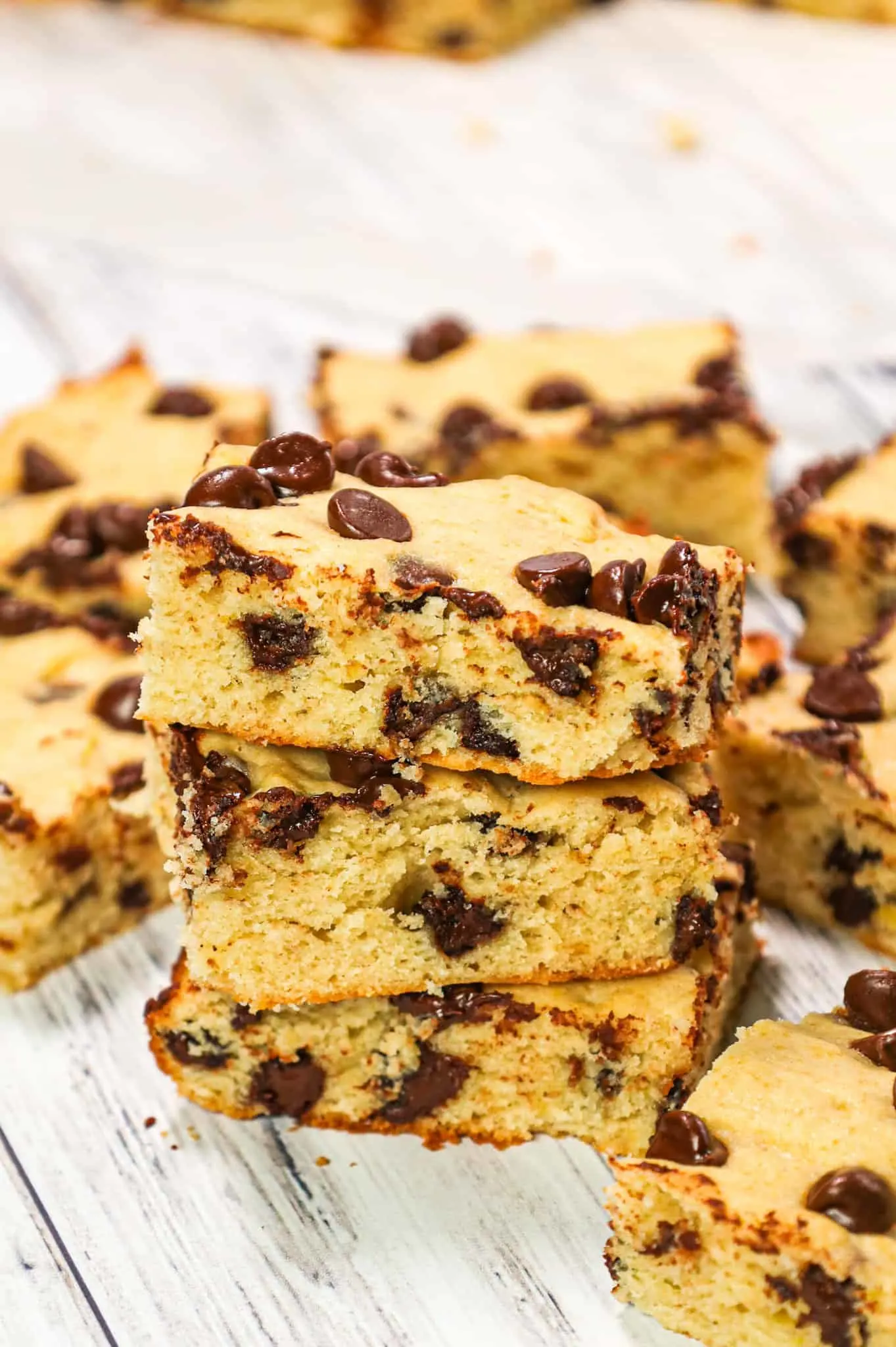 Banana Chocolate Chip Bars are an easy dessert recipe made with ripe bananas and loaded with semi sweet chocolate chips.