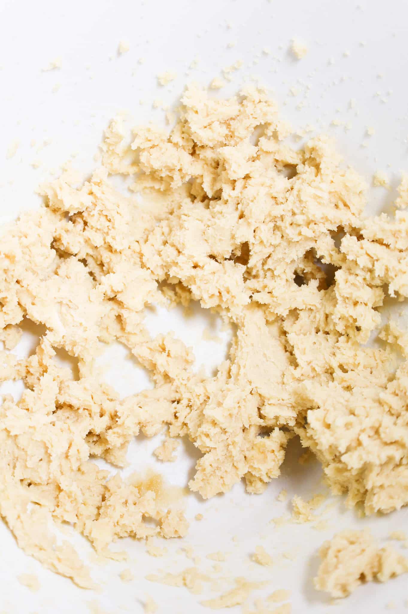 creamed butter and sugar mixture in a mixing bowl